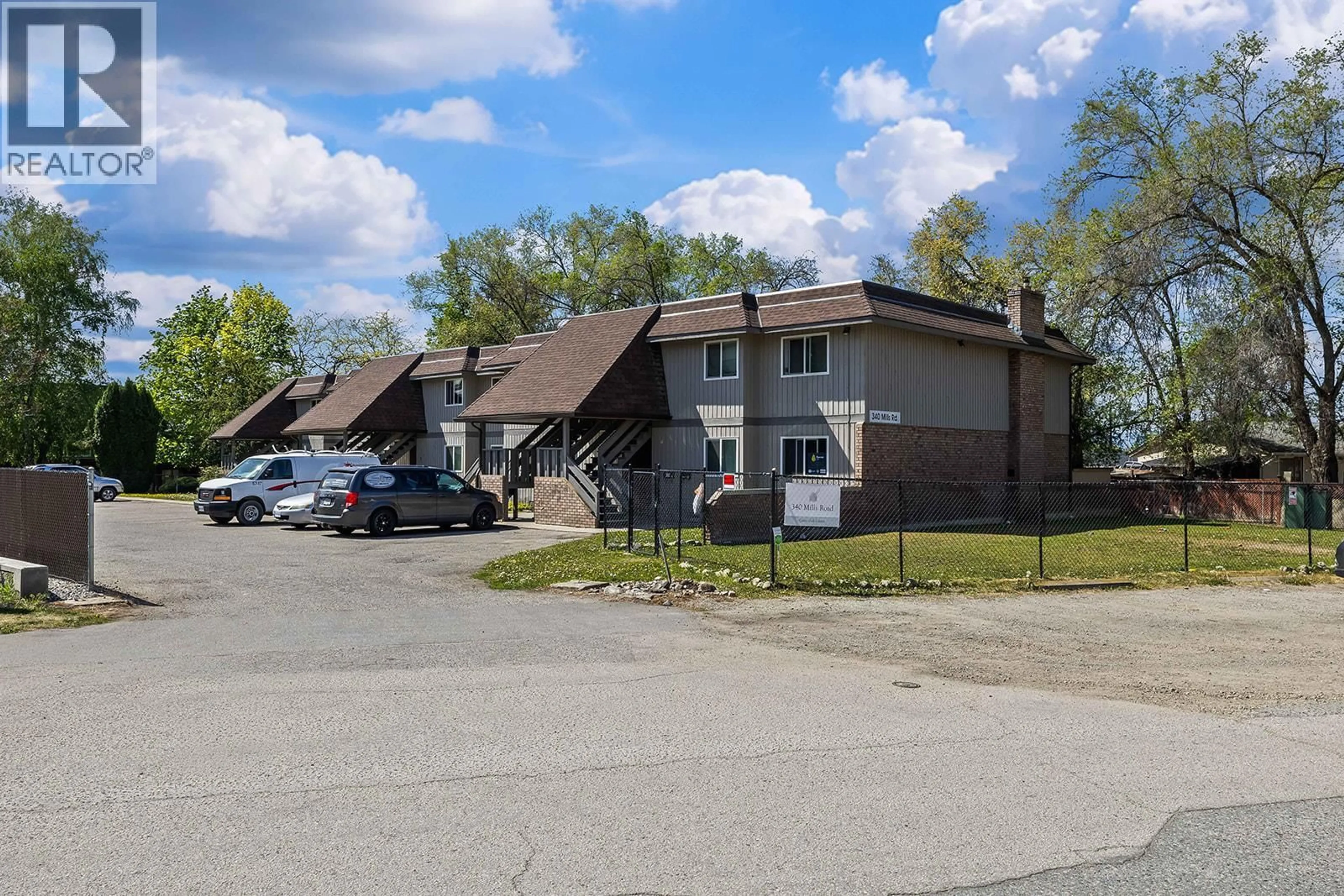 A pic from outside/outdoor area/front of a property/back of a property/a pic from drone, street for 5 - 340 MILLS ROAD, Kelowna British Columbia V1X4G8