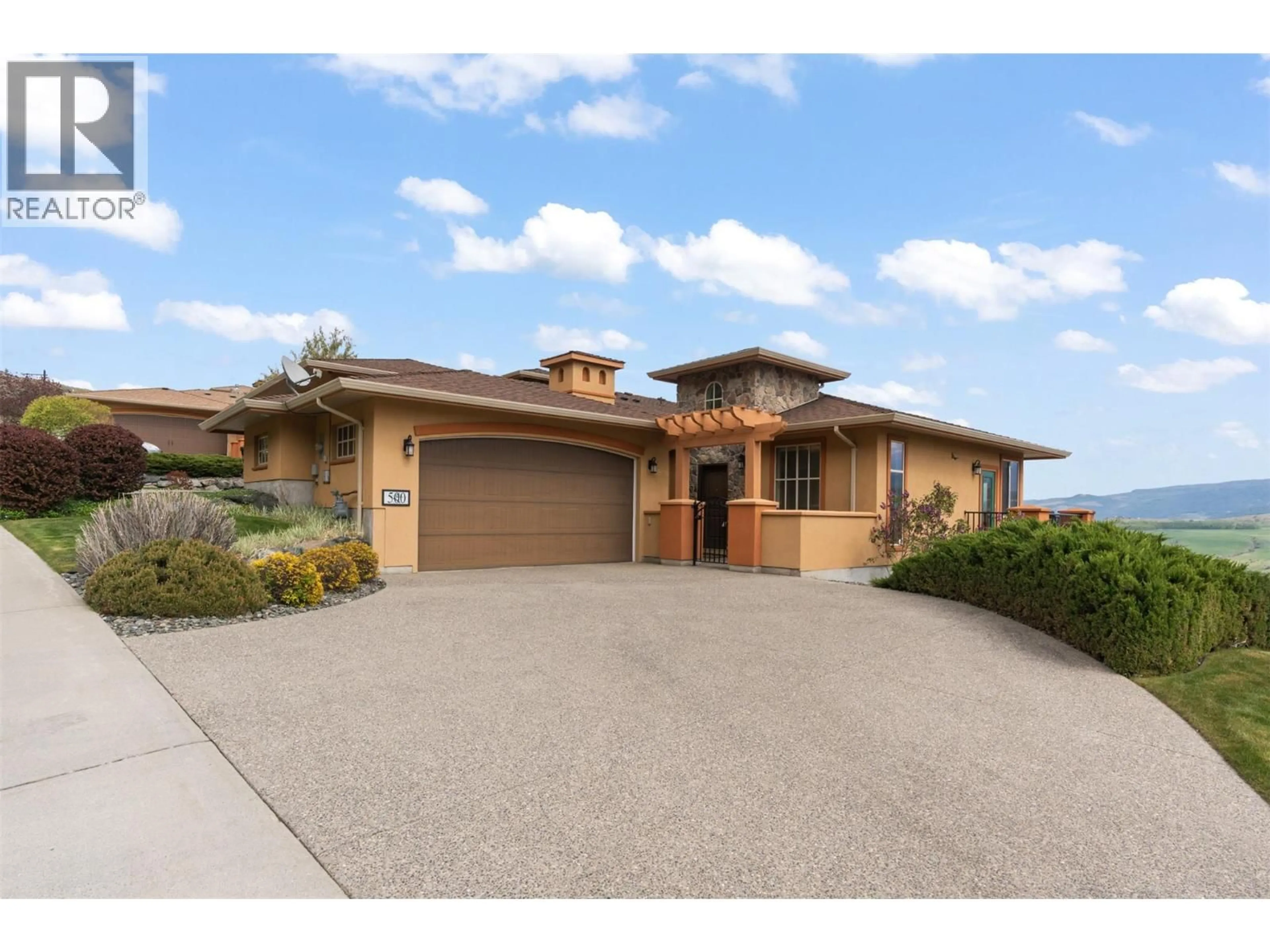 Home with brick exterior material, street for 500 BALSAM COURT, Vernon British Columbia V1H2J1