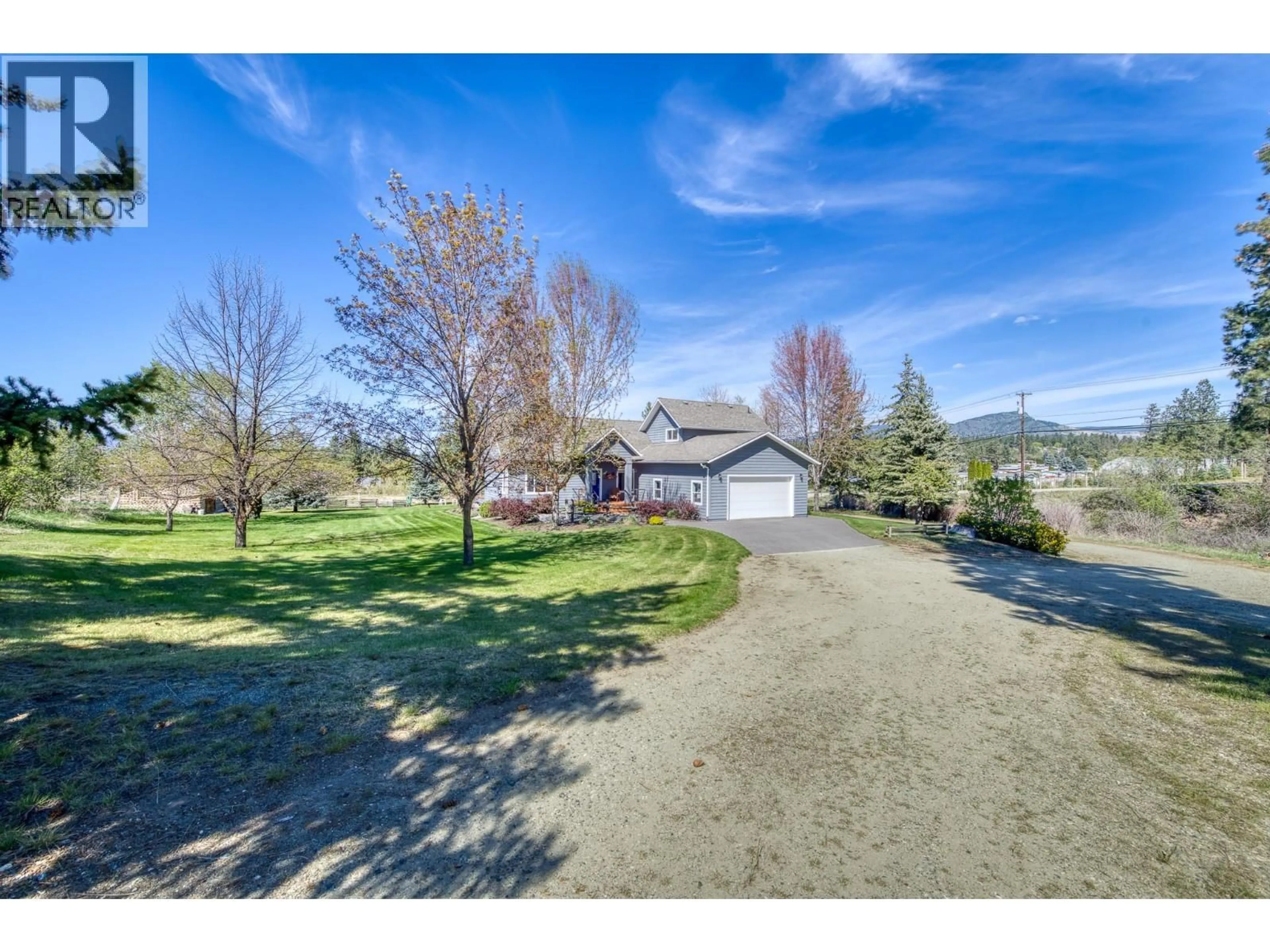 A pic from outside/outdoor area/front of a property/back of a property/a pic from drone, unknown for 3990 JUNE SPRINGS ROAD, Kelowna British Columbia V1W4E4