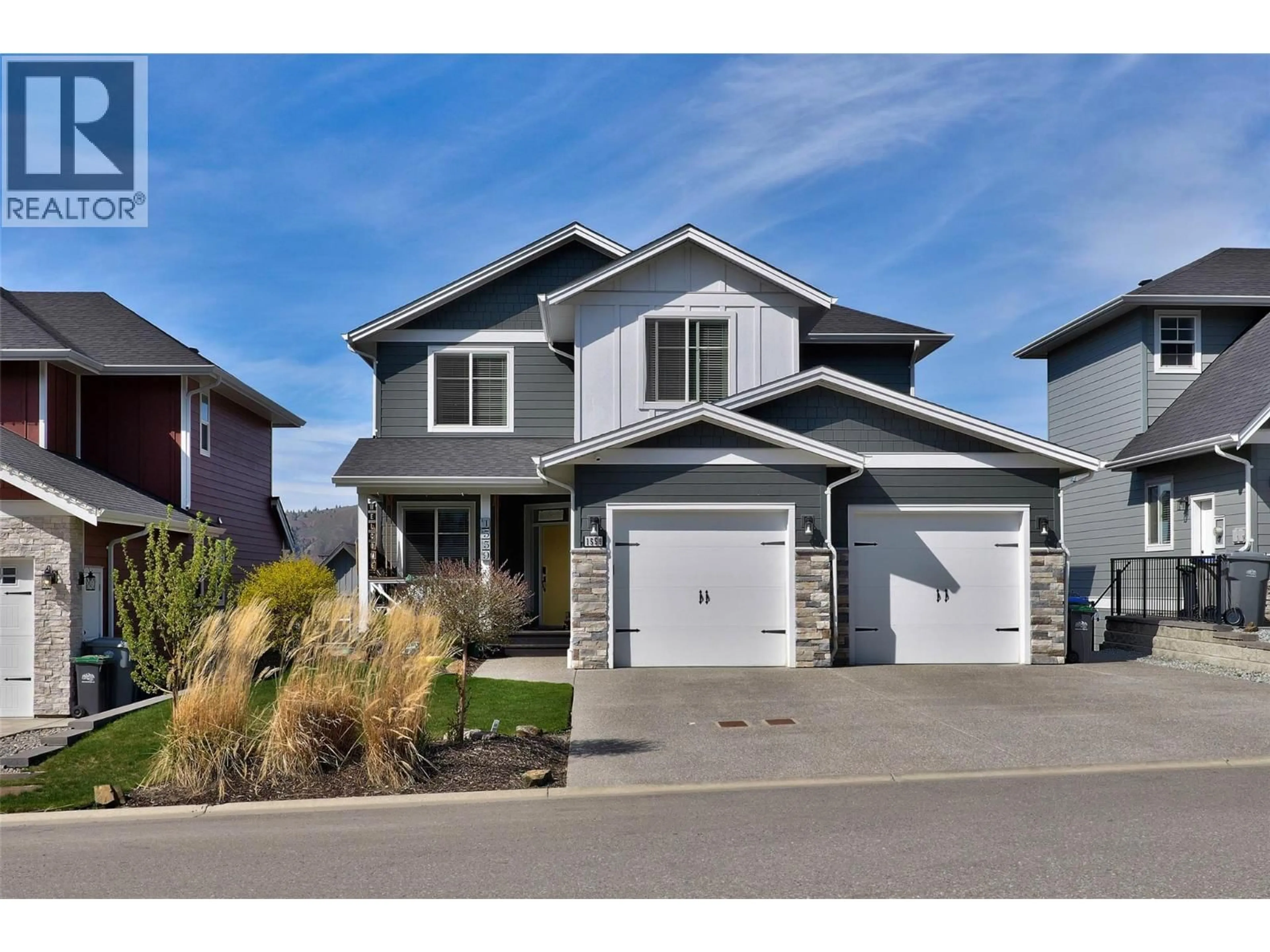 Home with vinyl exterior material, street for 1559 EMERALD DRIVE, Kamloops British Columbia V2E0C4