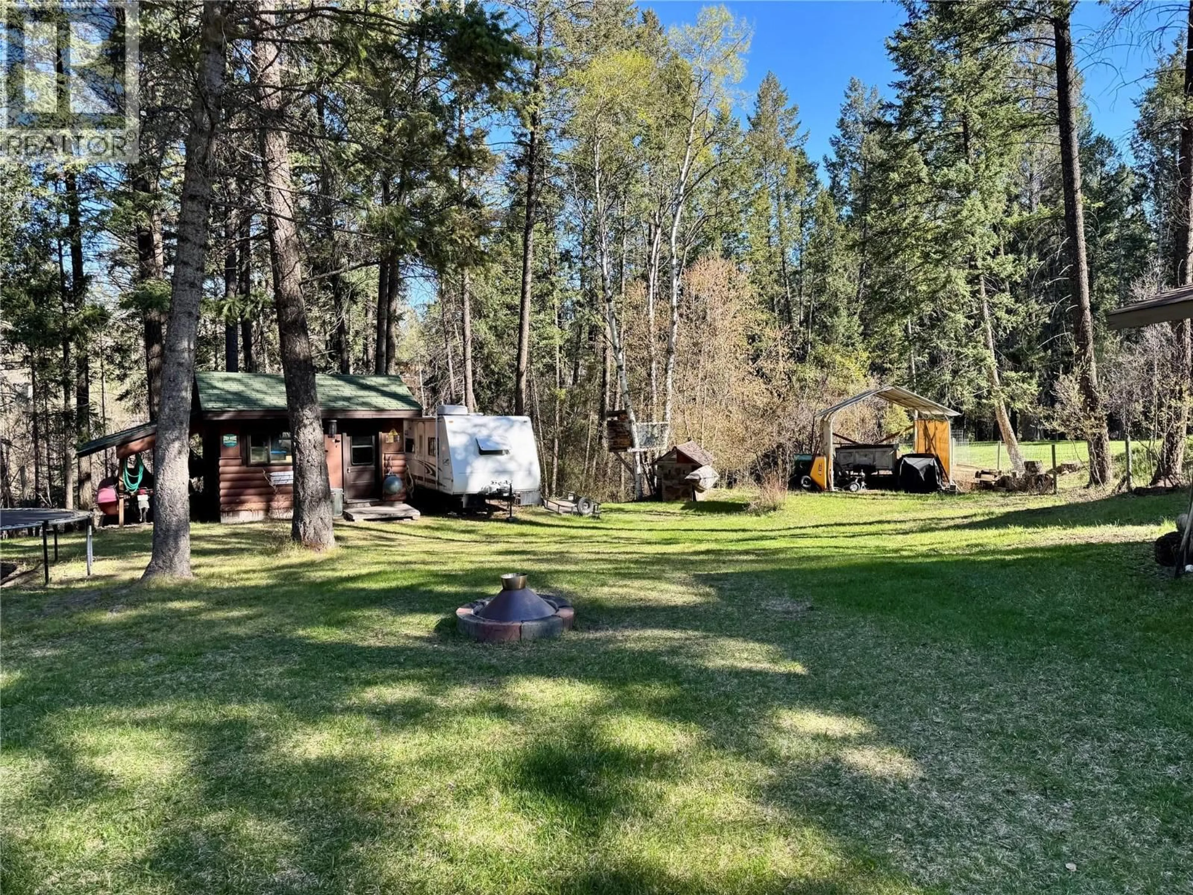 A pic from outside/outdoor area/front of a property/back of a property/a pic from drone, forest/trees view for 4775 NELLES CRESCENT, Windermere British Columbia V0B2L0
