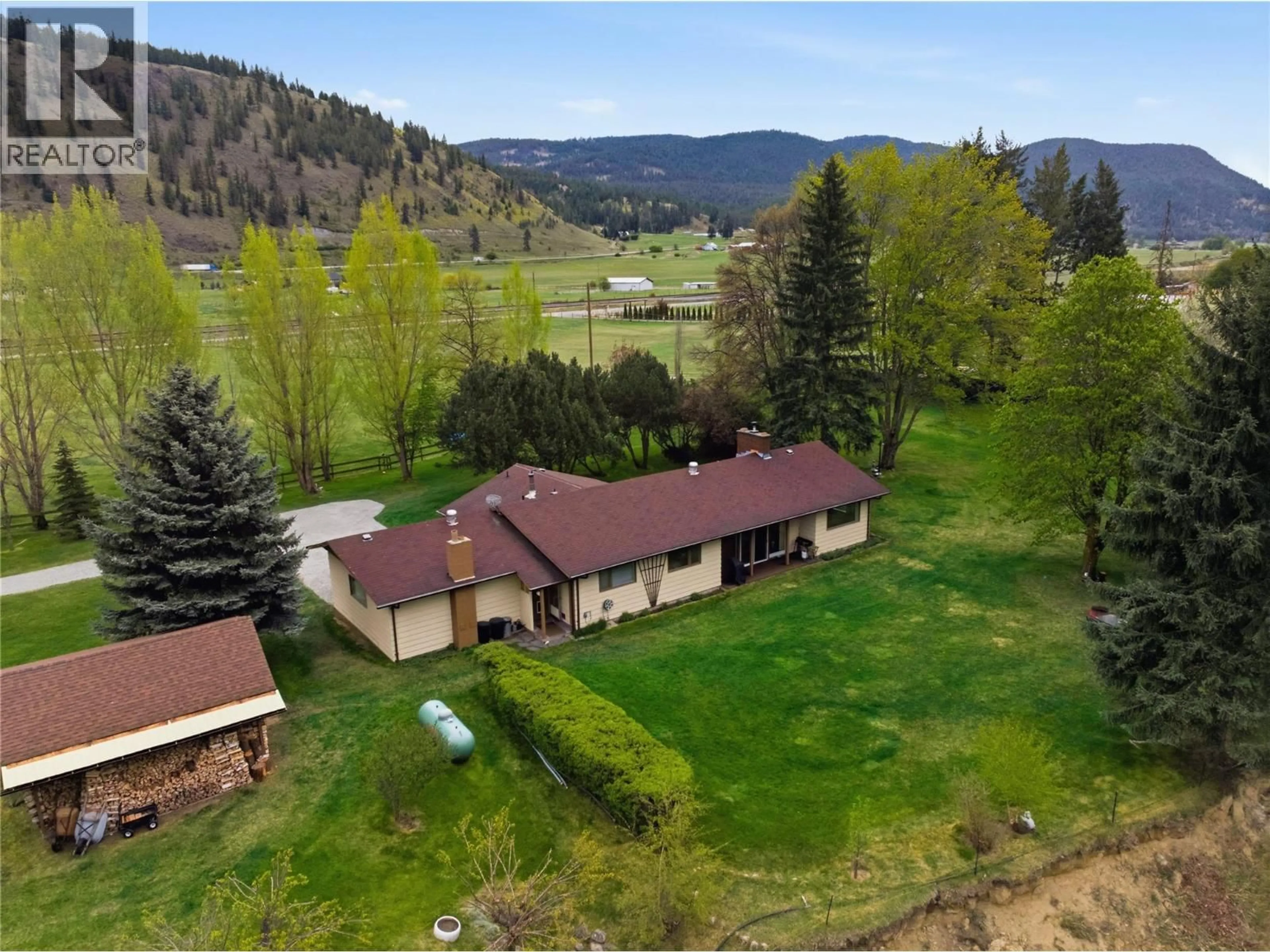 A pic from outside/outdoor area/front of a property/back of a property/a pic from drone, mountain view for 8753 VETERAN ROAD, Kamloops British Columbia V0E1Z2