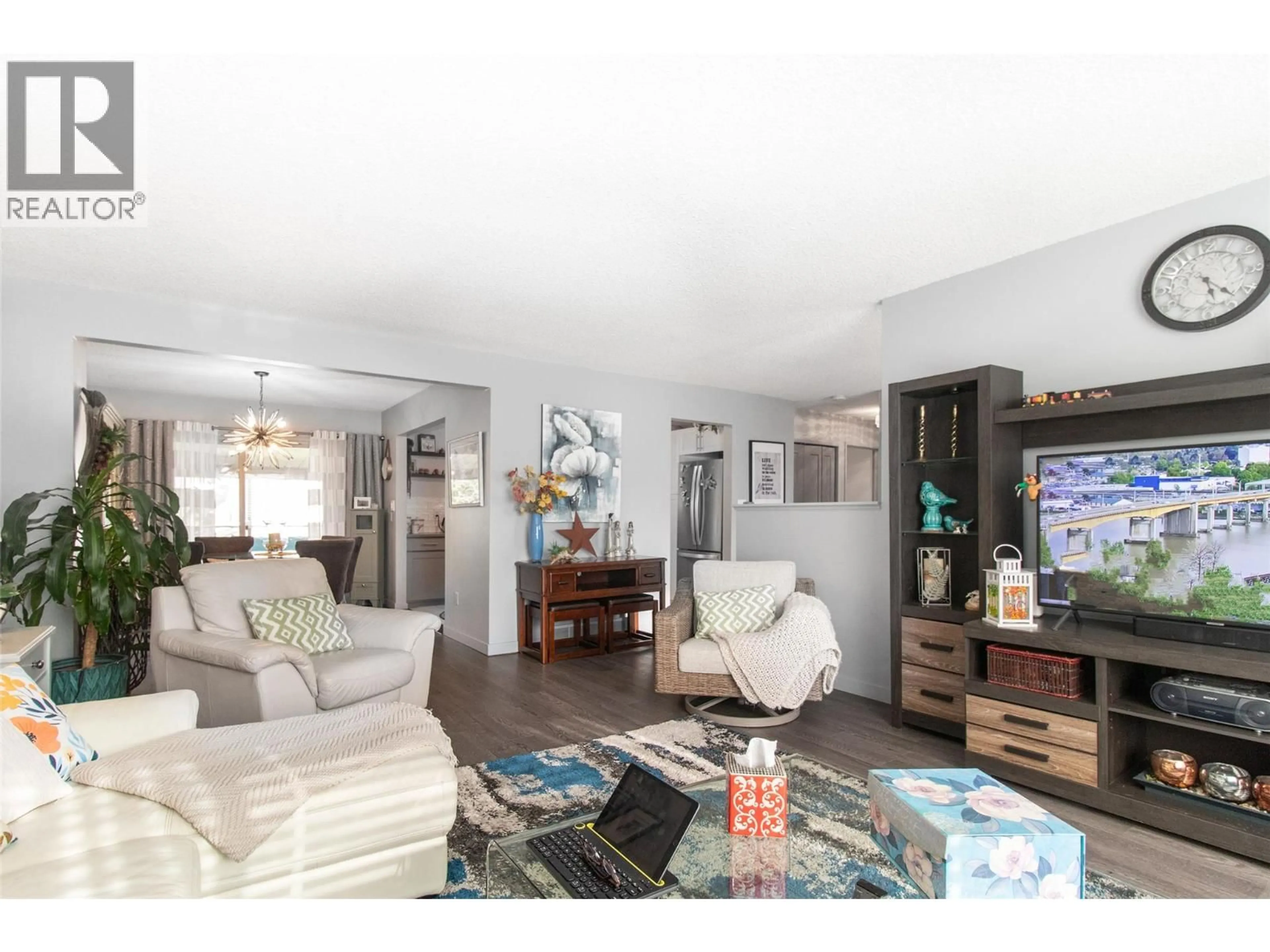 Living room with furniture, wood/laminate floor for 2111 WILKINSON STREET, Kelowna British Columbia V1Y4A1