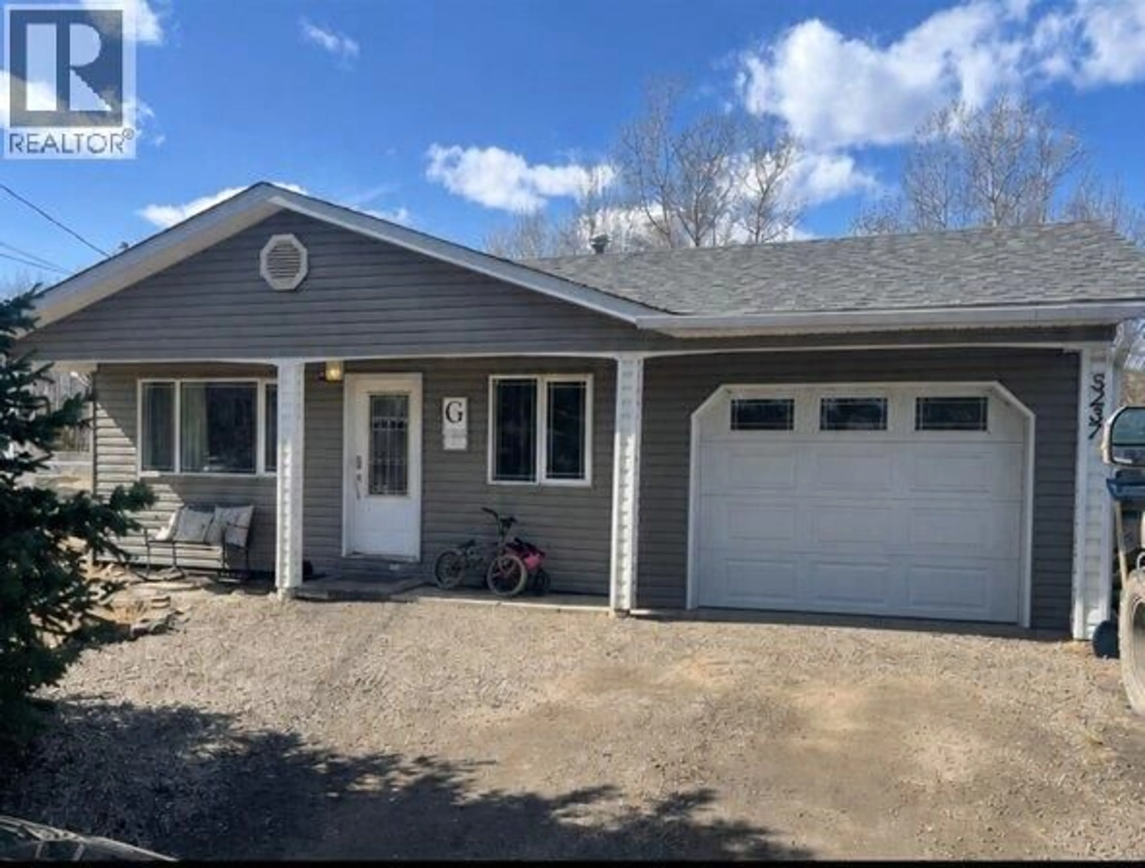 Home with vinyl exterior material, street for 5237 42 STREET NORTHEAST, Chetwynd British Columbia V0C1J0