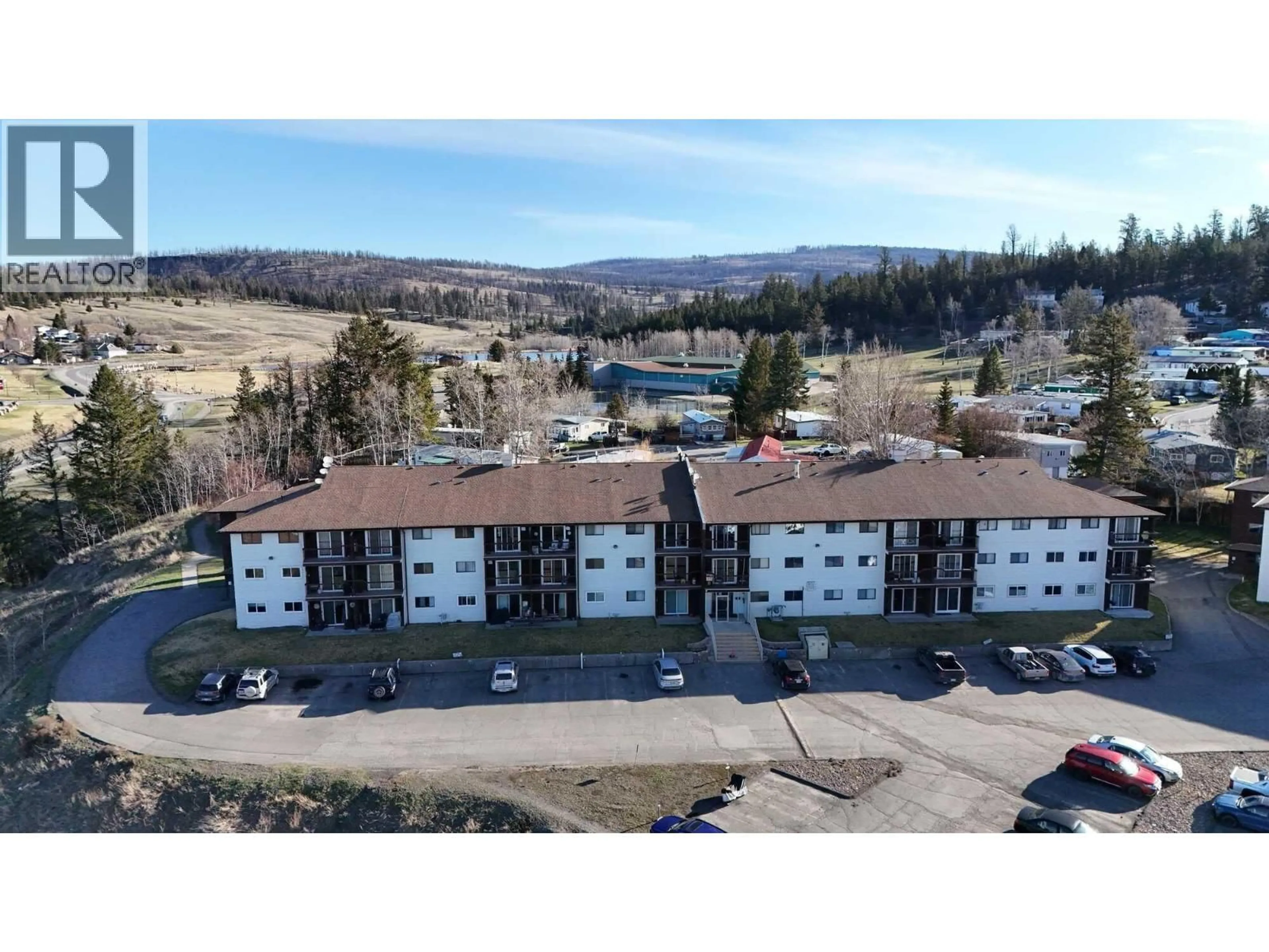 A pic from outside/outdoor area/front of a property/back of a property/a pic from drone, water/lake/river/ocean view for 103 - 280 ALDER DRIVE, Logan Lake British Columbia V0K1W0