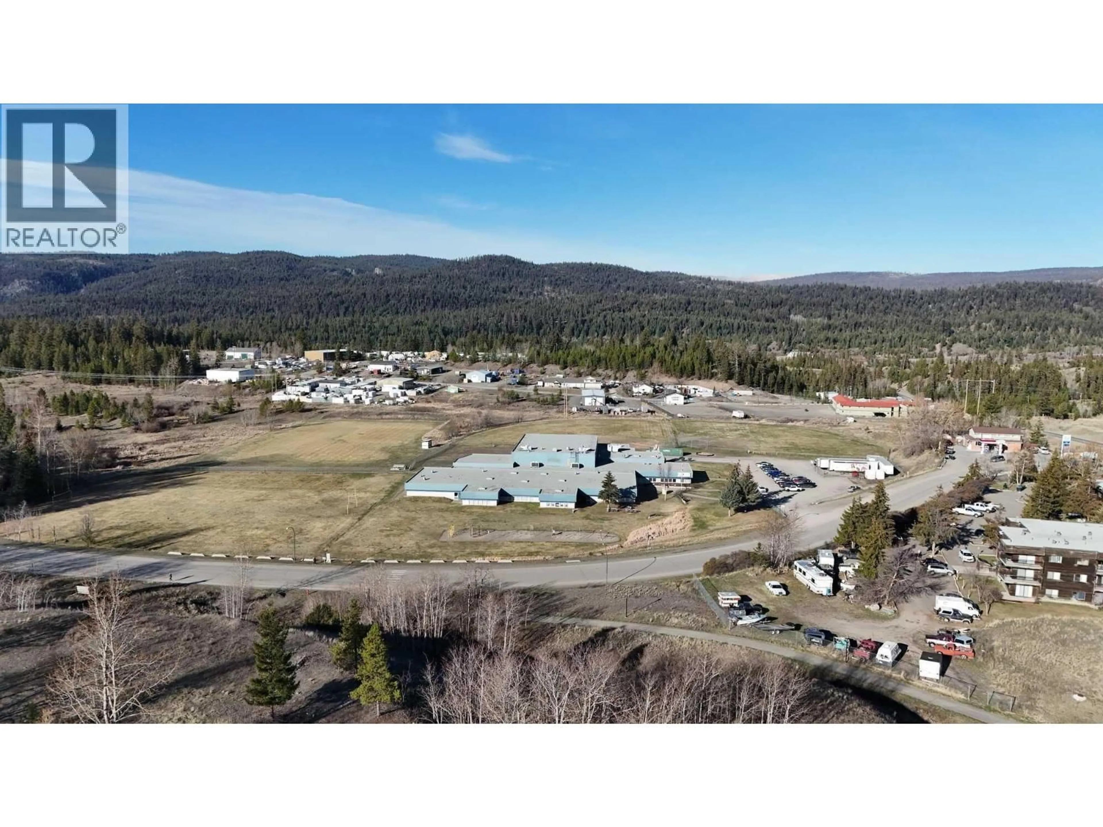 A pic from outside/outdoor area/front of a property/back of a property/a pic from drone, mountain view for 103 - 280 ALDER DRIVE, Logan Lake British Columbia V0K1W0
