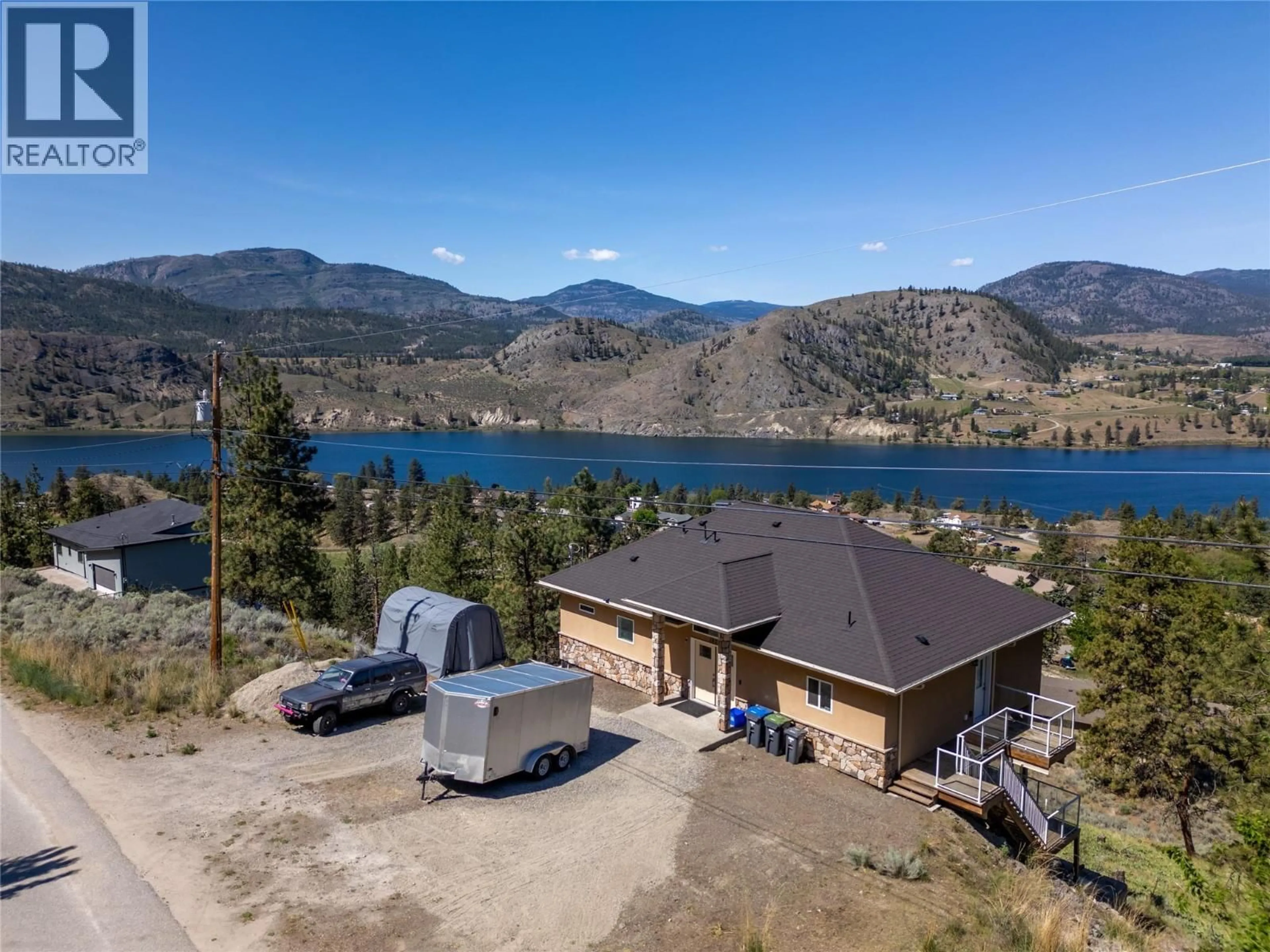 A pic from outside/outdoor area/front of a property/back of a property/a pic from drone, water/lake/river/ocean view for 182 RACETTE WAY, Okanagan Falls British Columbia V0H1R5