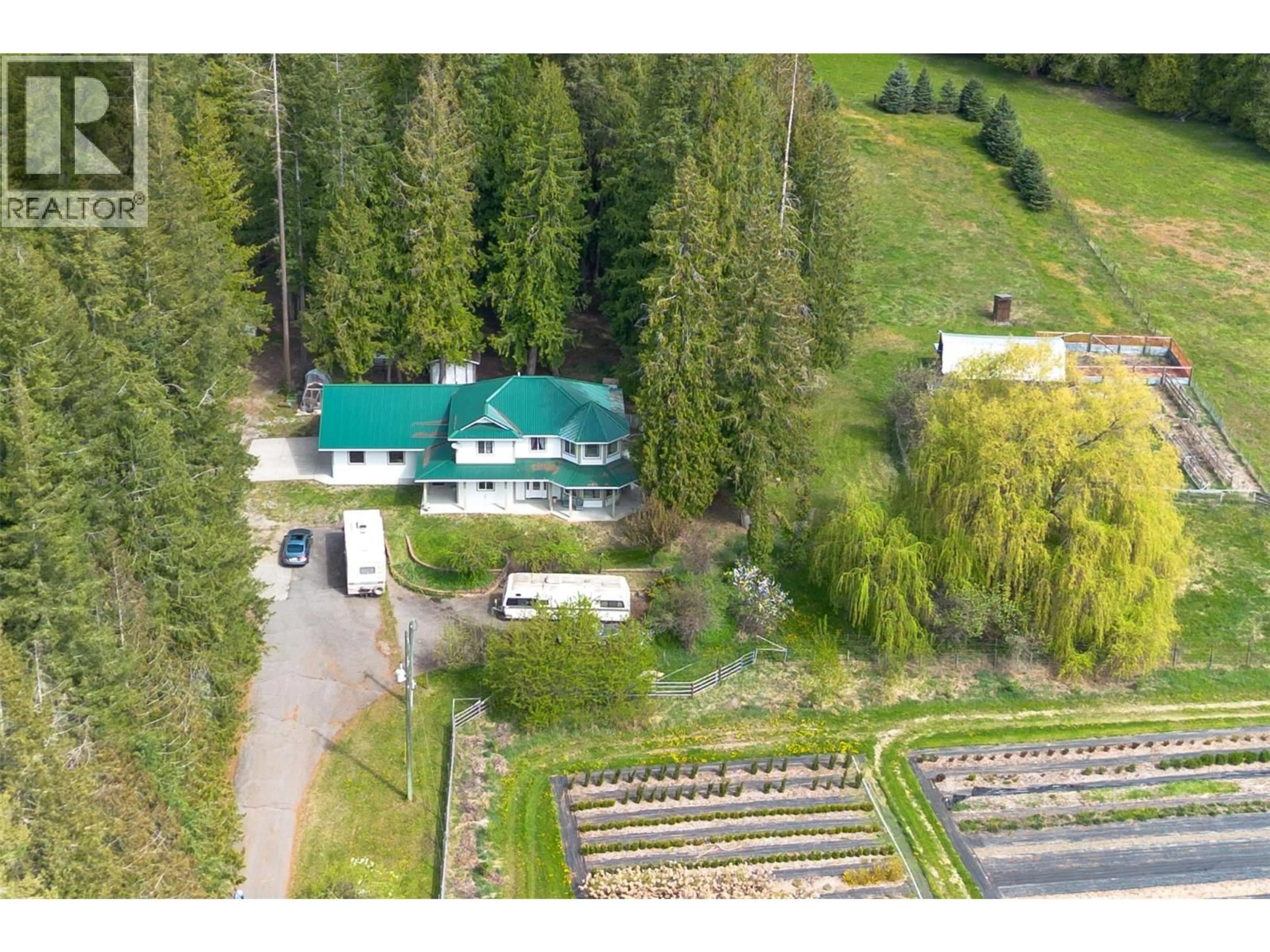 A pic from outside/outdoor area/front of a property/back of a property/a pic from drone, mountain view for 741 ENDERBY MABEL LAKE ROAD, Enderby British Columbia V4Y4K5