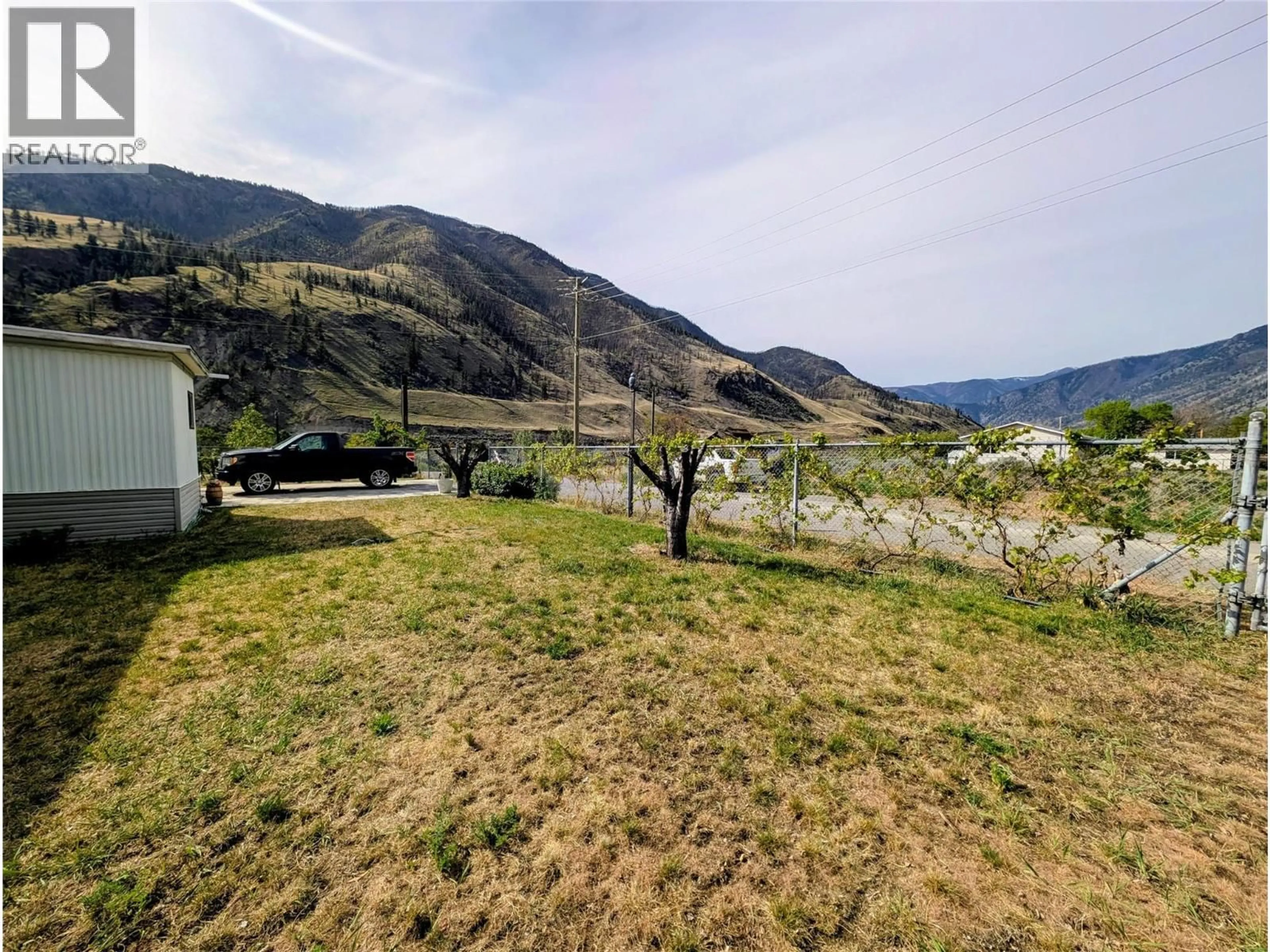A pic from outside/outdoor area/front of a property/back of a property/a pic from drone, mountain view for 3741 THOMPSON VIEW STREET, Ashcroft British Columbia V0K2L0