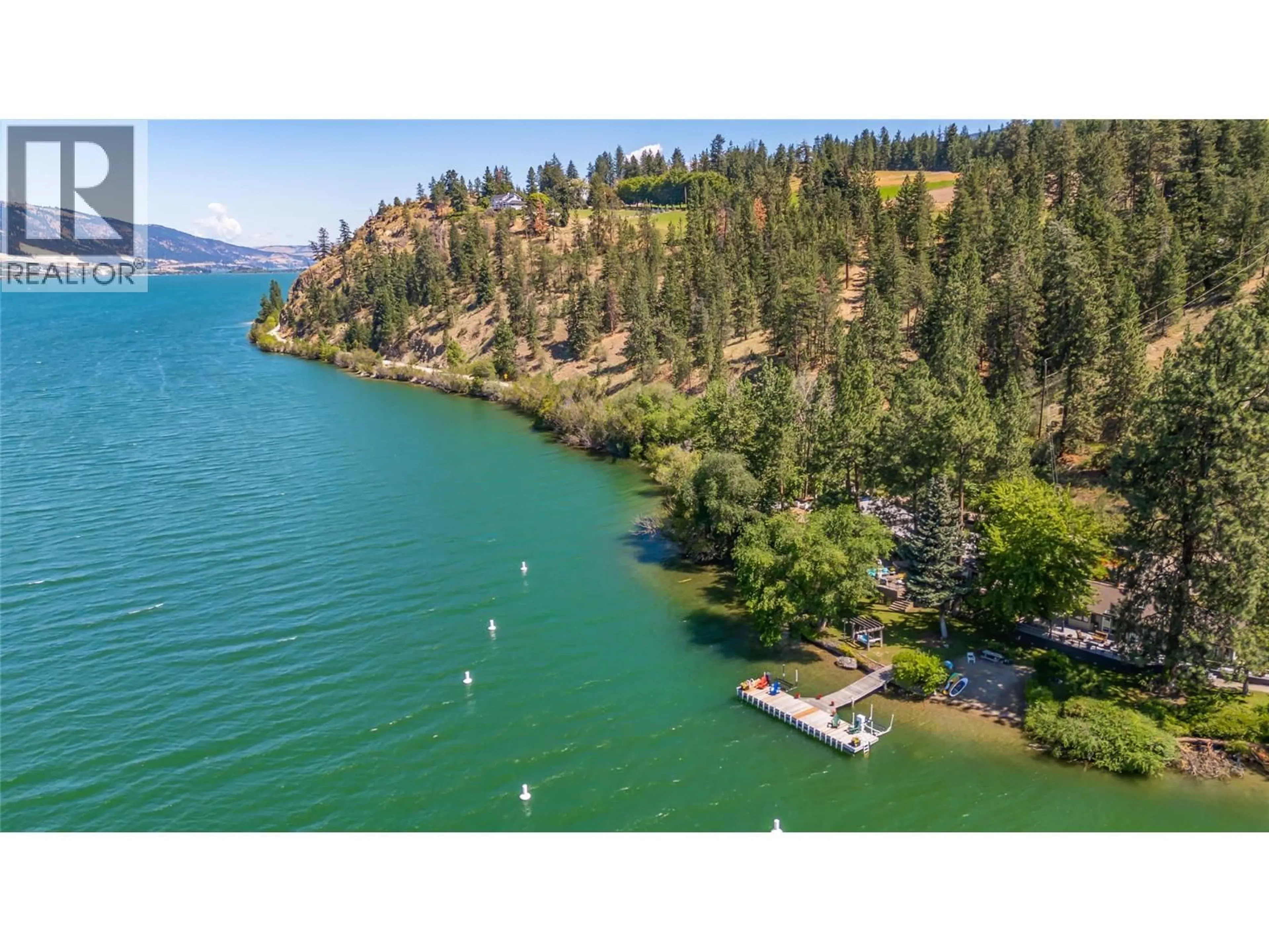 A pic from outside/outdoor area/front of a property/back of a property/a pic from drone, water/lake/river/ocean view for 12110 TREWHITT ROAD WEST, Lake Country British Columbia V4V2A6