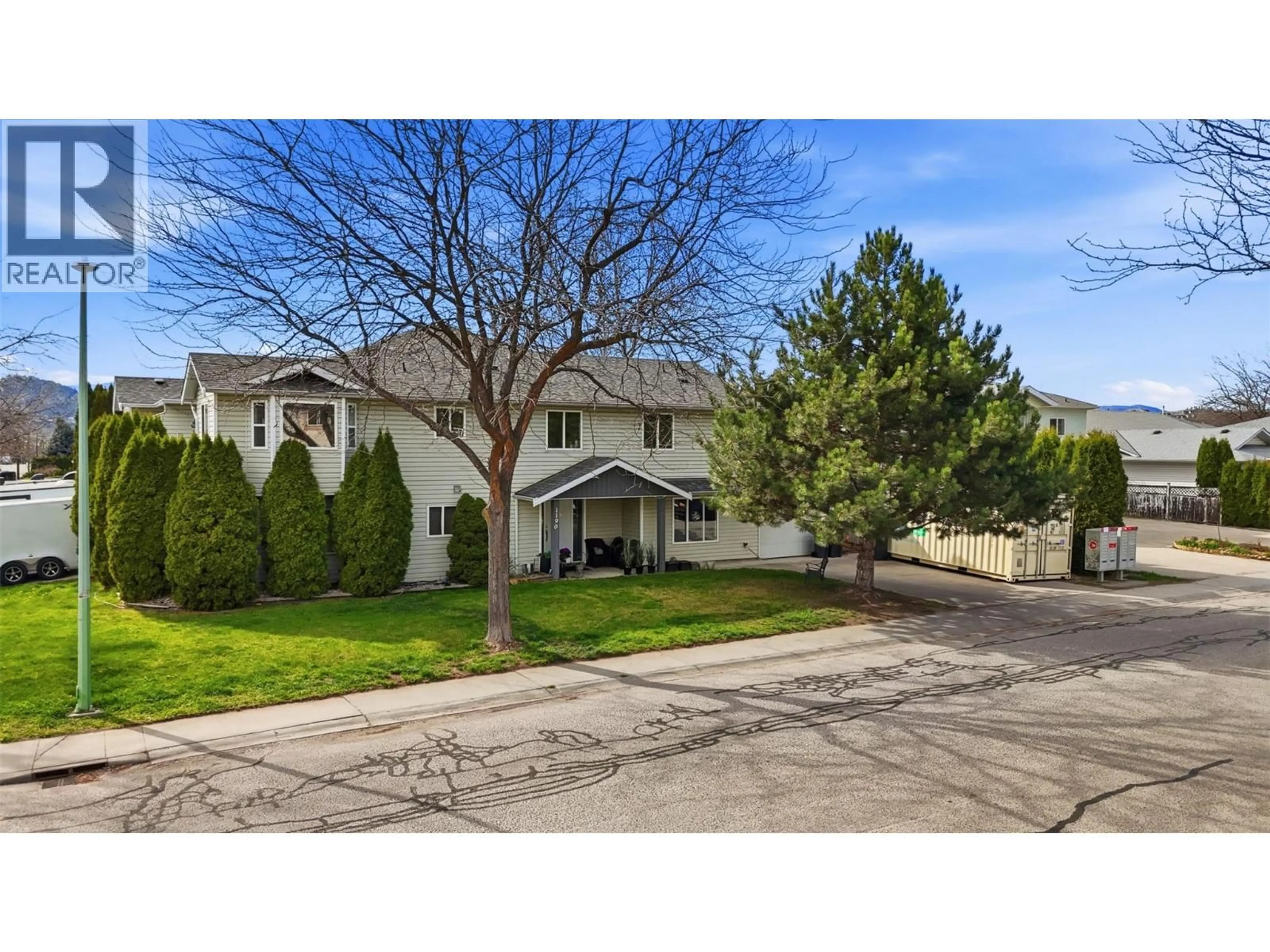 A pic from outside/outdoor area/front of a property/back of a property/a pic from drone, street for 1190 FRIESEN ROAD, Kelowna British Columbia V1X7N2