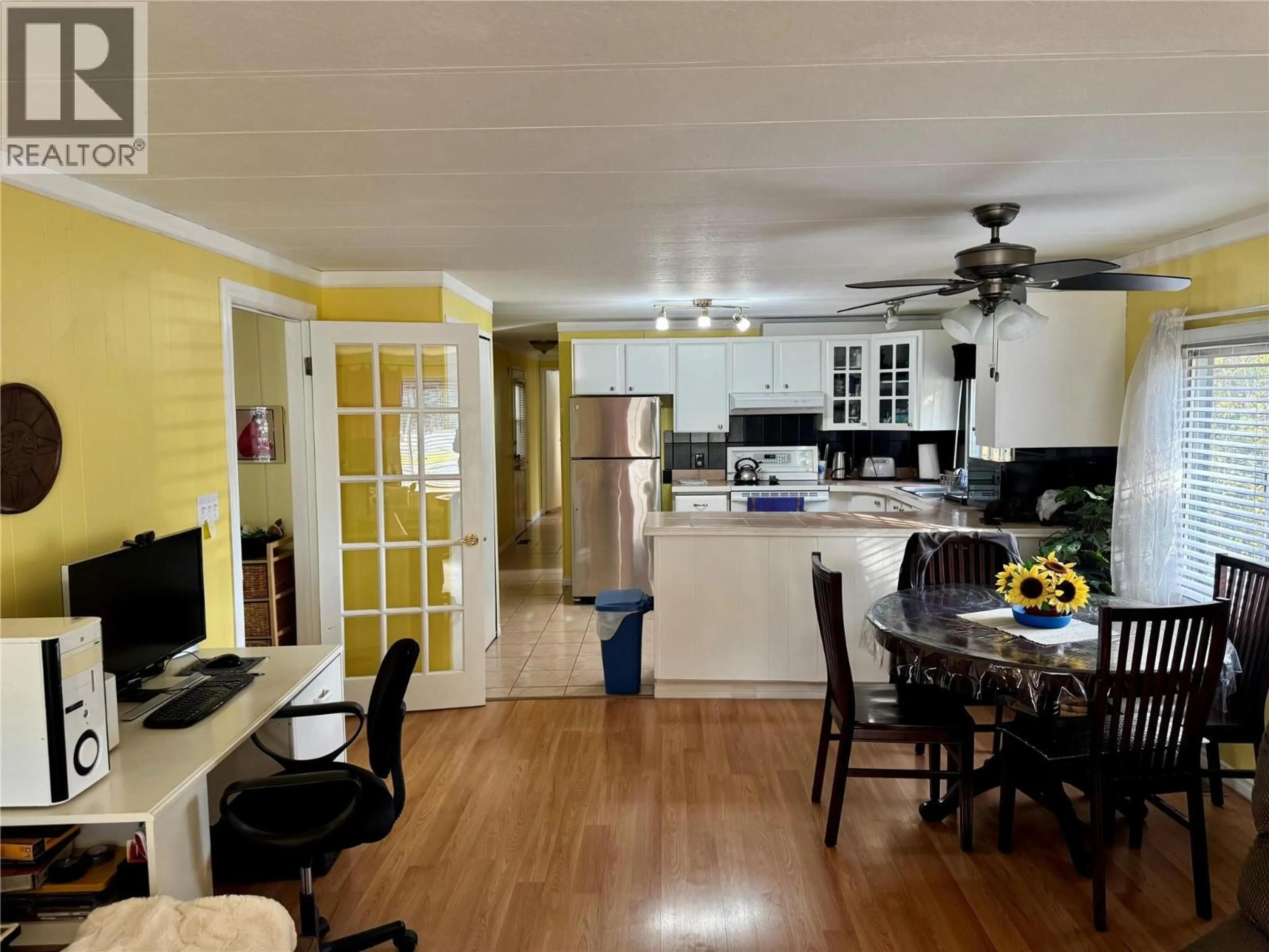 Open concept kitchen, wood/laminate floor for 47 - 1880 OLD BOUCHERIE ROAD, West Kelowna British Columbia V4T2B2