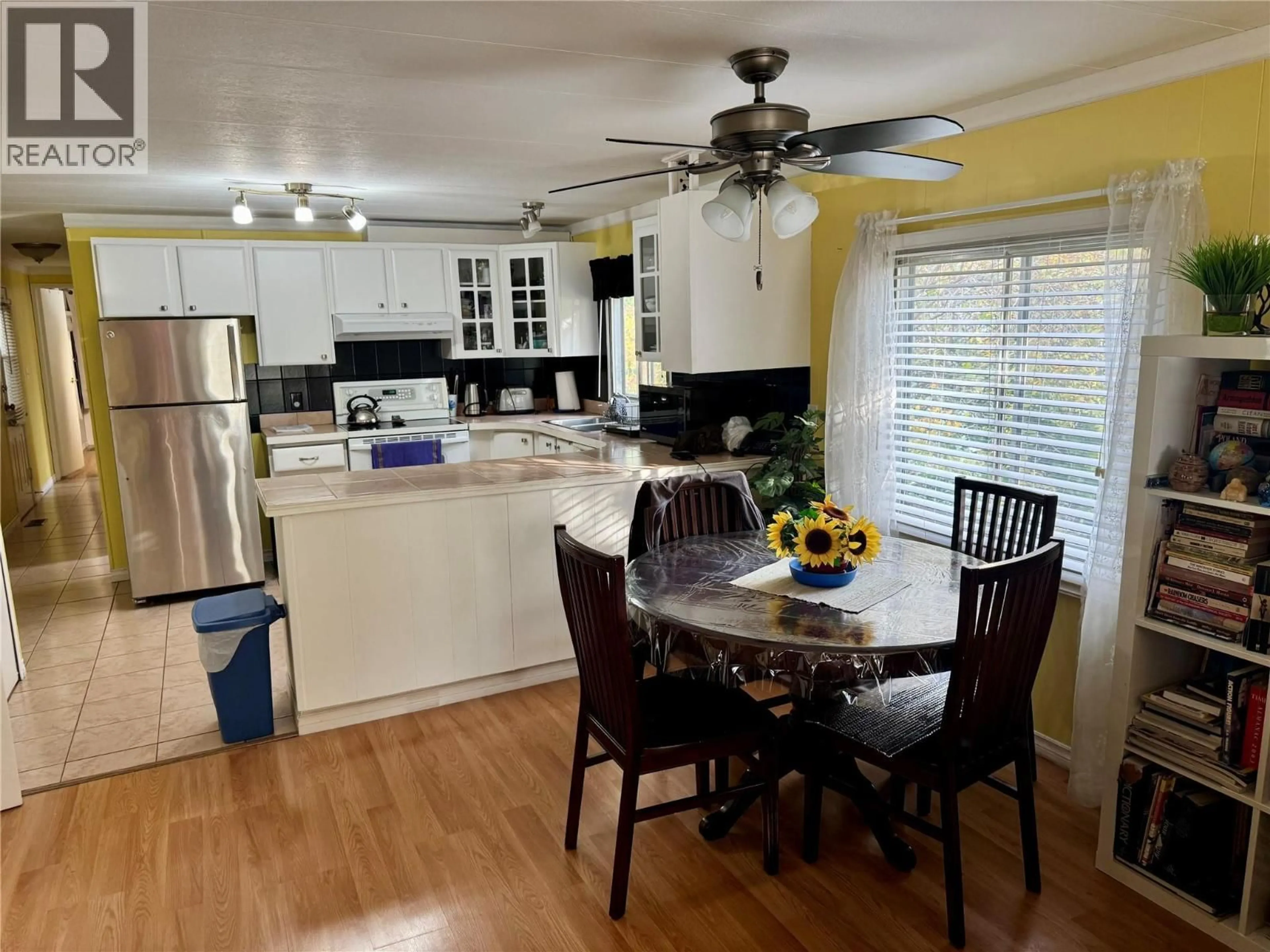 Open concept kitchen, wood/laminate floor for 47 - 1880 OLD BOUCHERIE ROAD, West Kelowna British Columbia V4T2B2