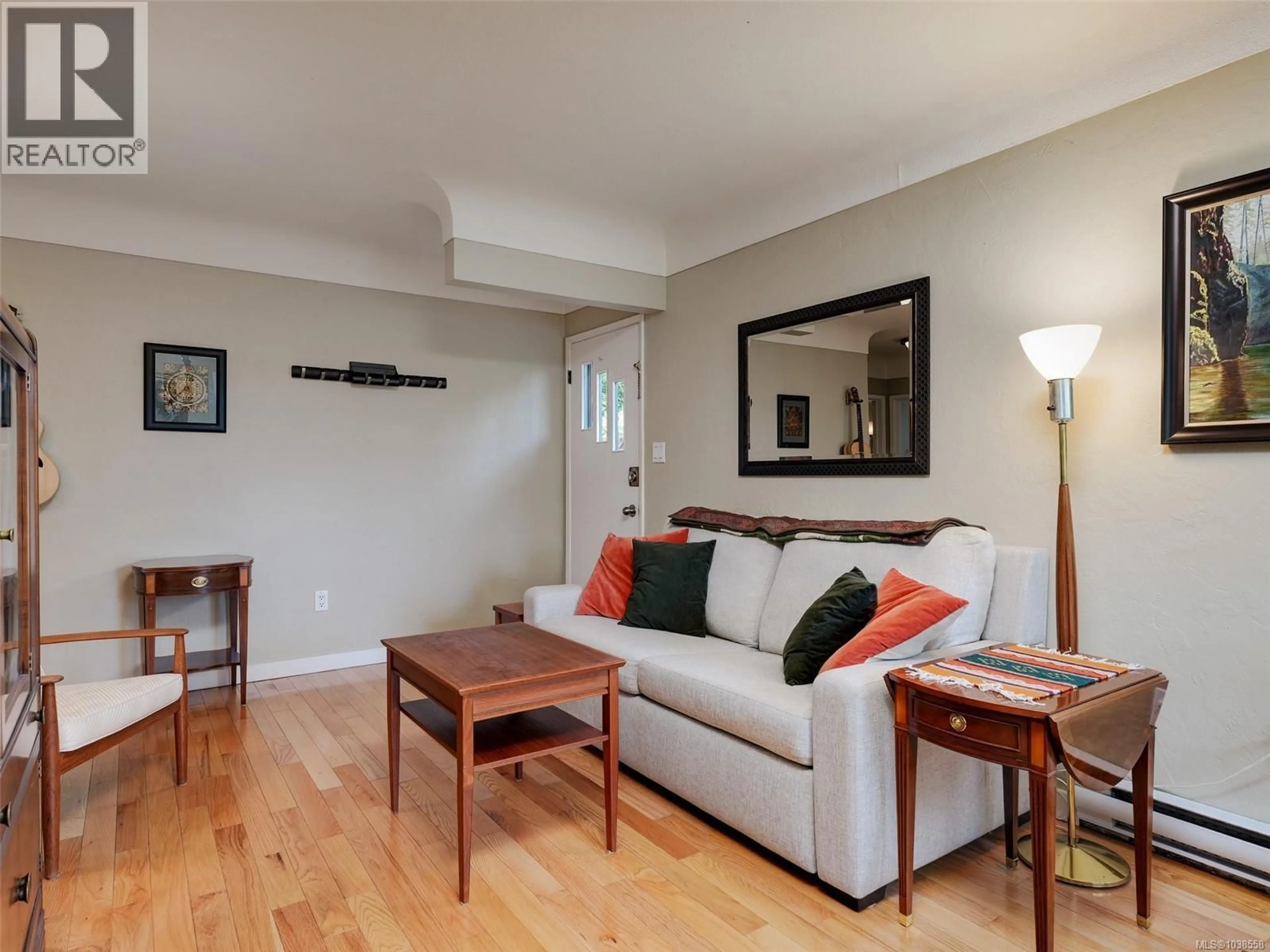 Living room with furniture, wood/laminate floor for 2528 FORBES STREET, Victoria British Columbia V8R4B8
