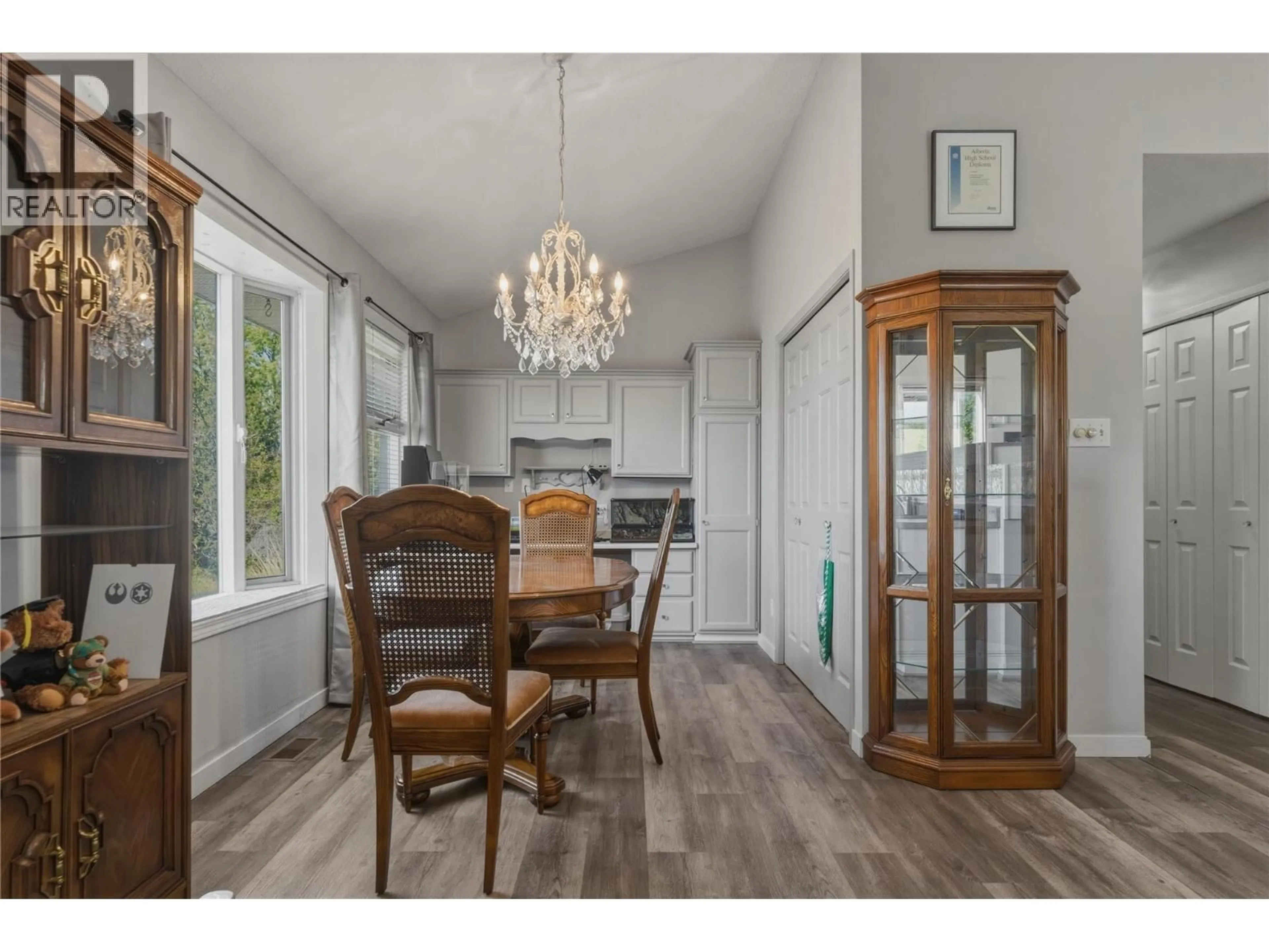 Dining room, wood/laminate floor for 1800 20 STREET, Vernon British Columbia V1T9B6