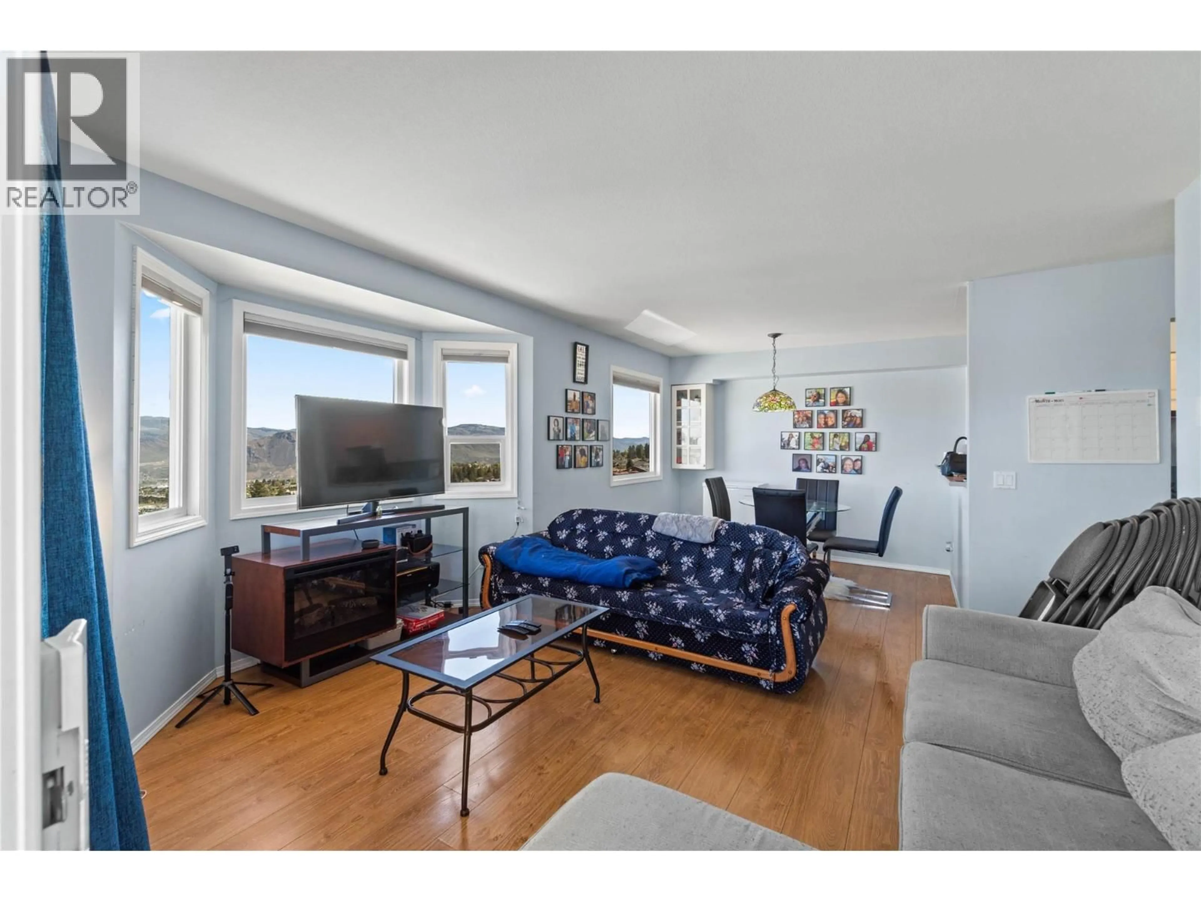 Living room with furniture, wood/laminate floor for 406 - 1160 HUGH ALLAN DRIVE, Kamloops British Columbia V1S1T5