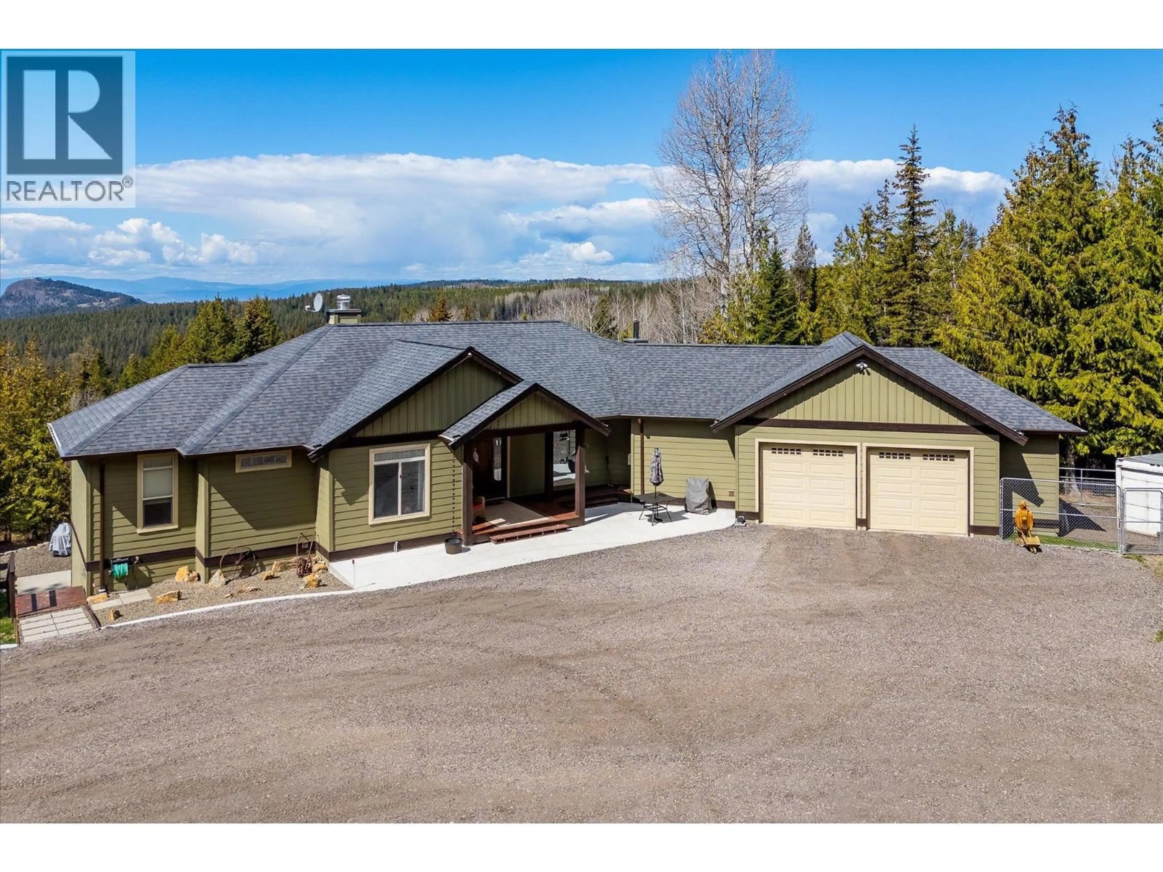 A pic from outside/outdoor area/front of a property/back of a property/a pic from drone, mountain view for 1788 BOONE COURT, Kelowna British Columbia V1P1H7