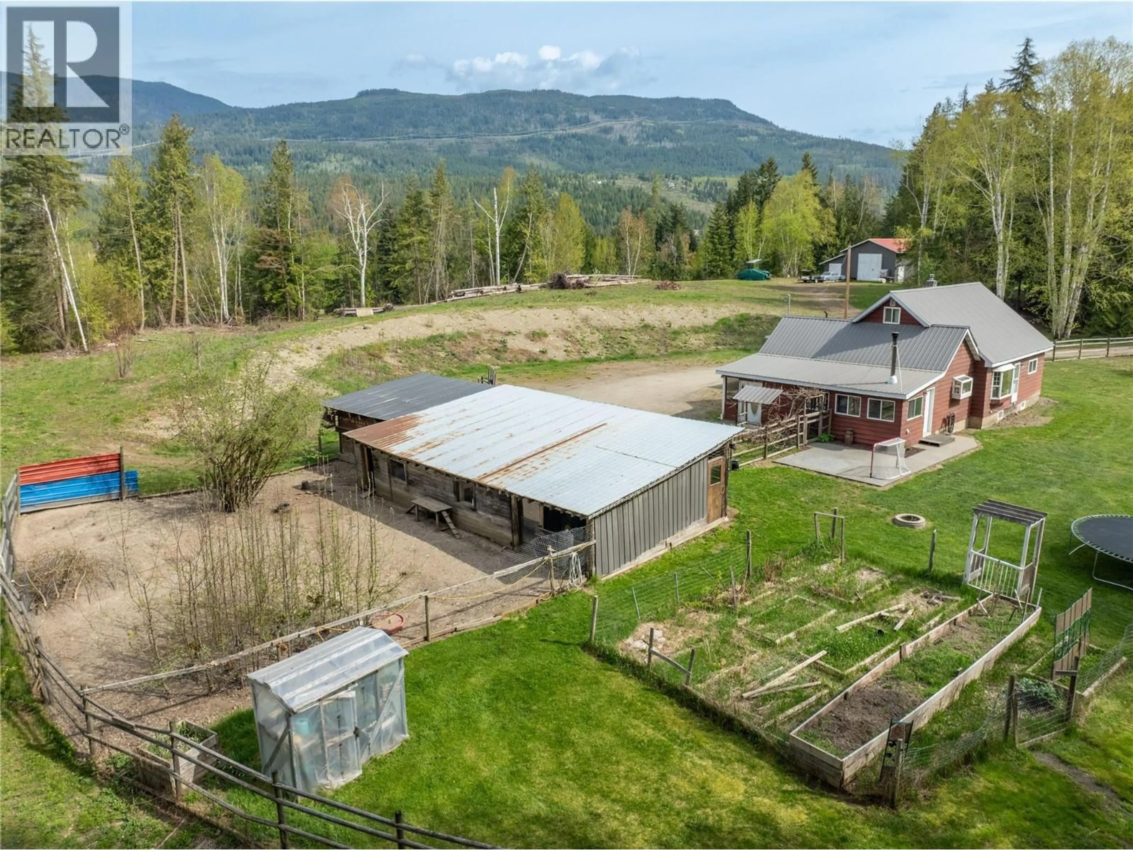 A pic from outside/outdoor area/front of a property/back of a property/a pic from drone, mountain view for 3381 TRINITY VALLEY ROAD, Enderby British Columbia V0E1V5