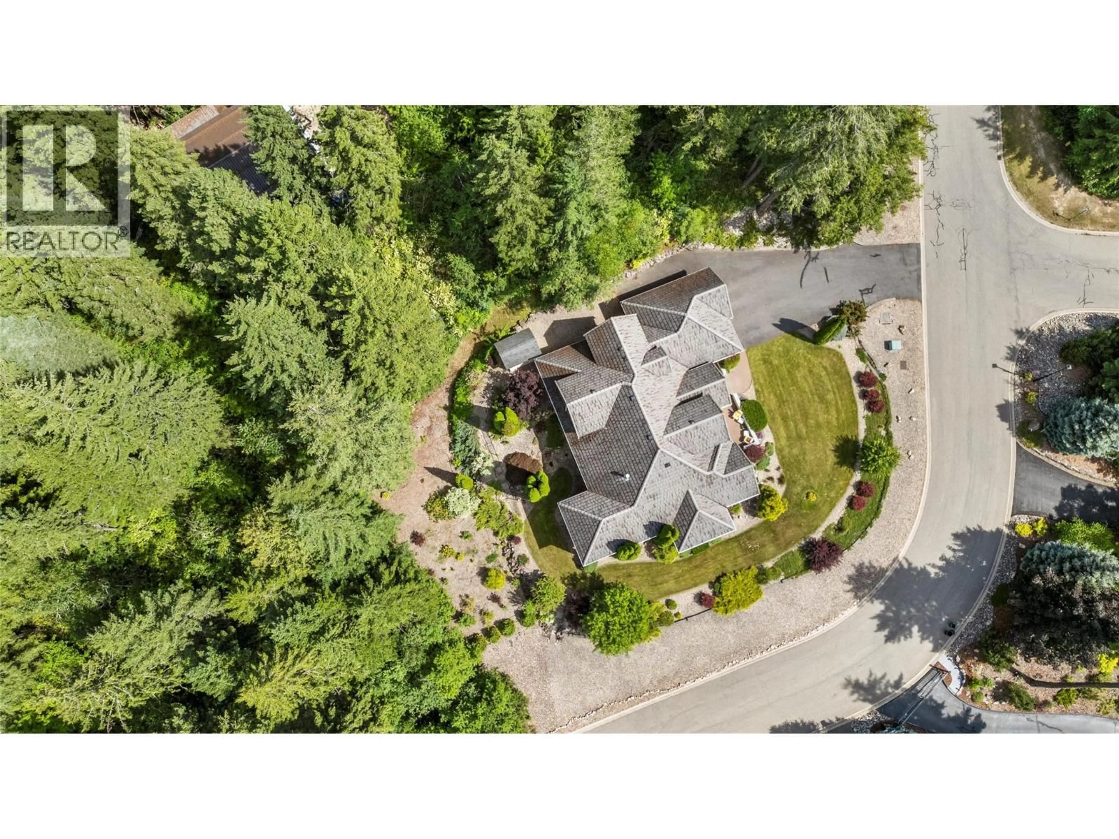 A pic from outside/outdoor area/front of a property/back of a property/a pic from drone, street for 1821 50 AVENUE NORTHEAST, Salmon Arm British Columbia V1E4P4
