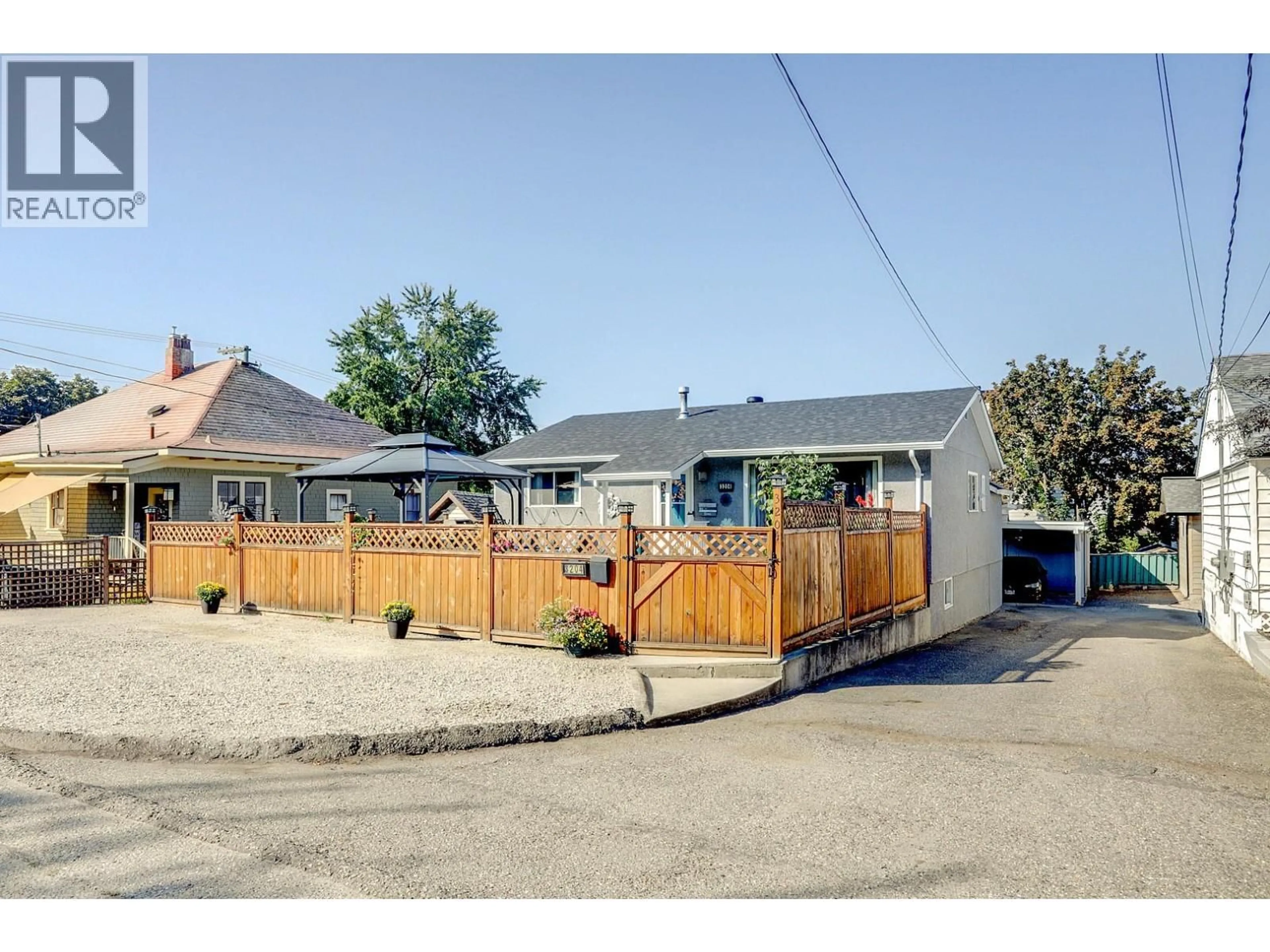 A pic from outside/outdoor area/front of a property/back of a property/a pic from drone, street for 3204 24 STREET, Vernon British Columbia V1T4N6