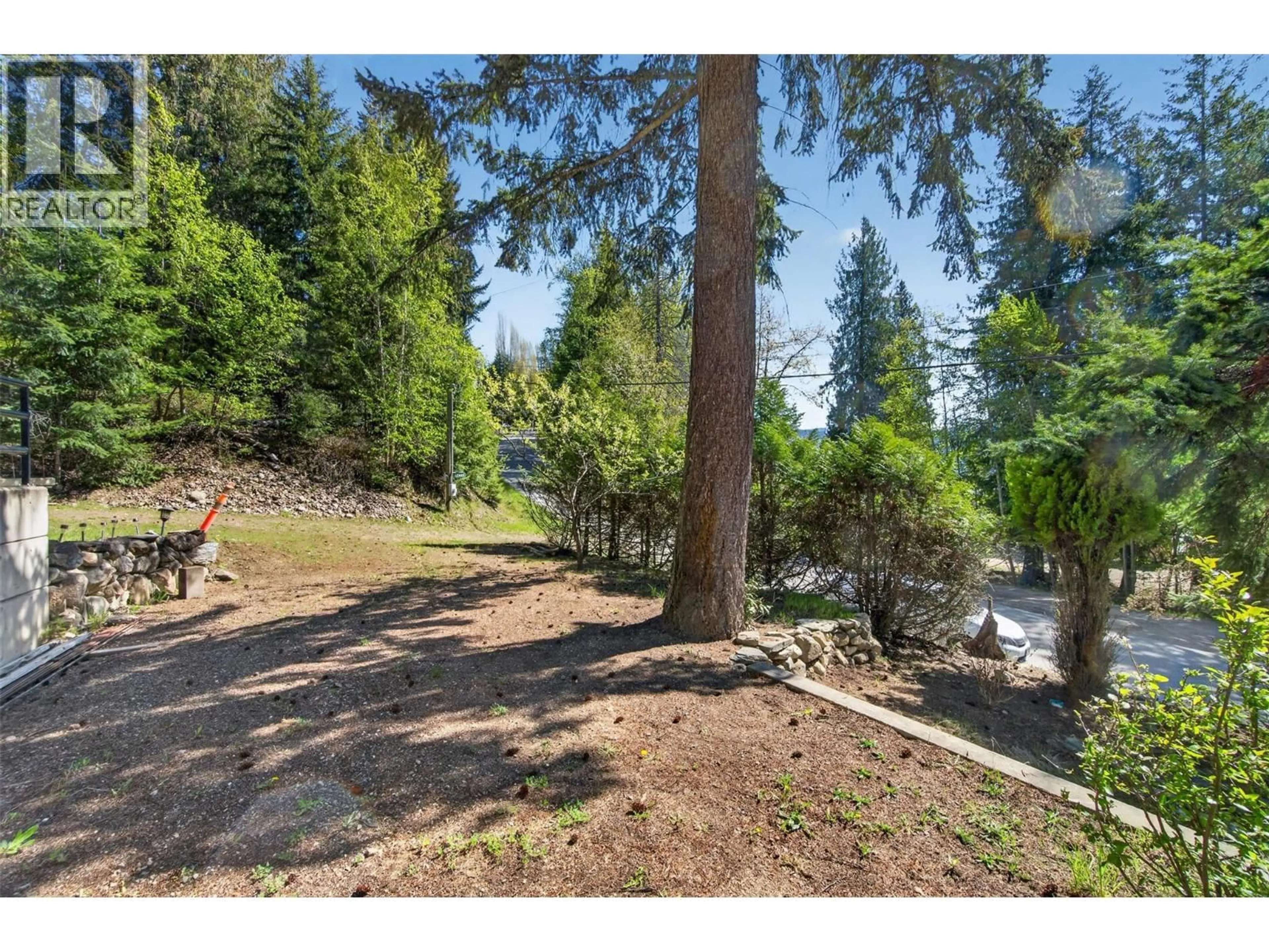 A pic from outside/outdoor area/front of a property/back of a property/a pic from drone, forest/trees view for 7689 GOLF COURSE ROAD, Anglemont British Columbia V0E1M8