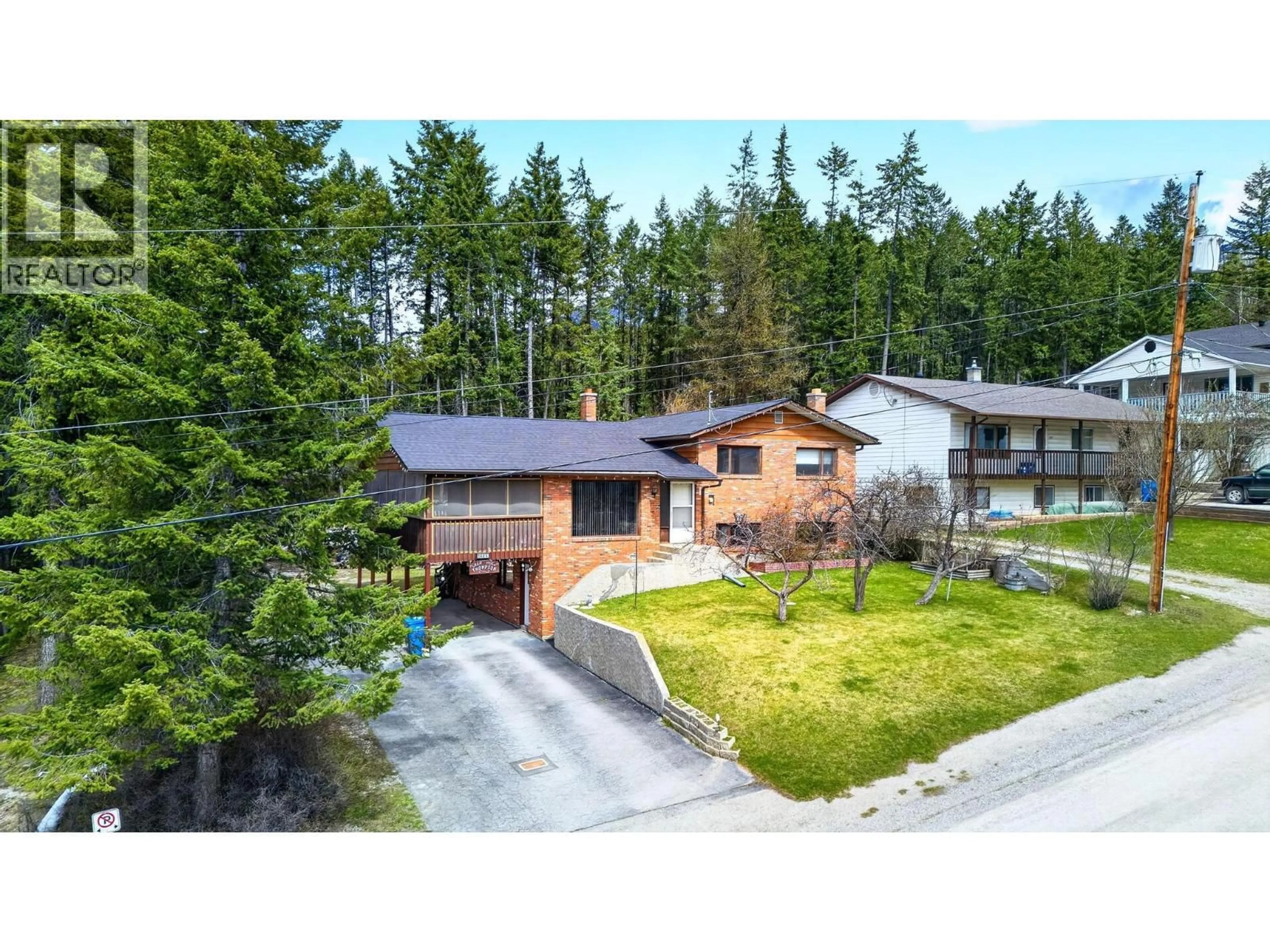 A pic from outside/outdoor area/front of a property/back of a property/a pic from drone, street for 1605 GAREB ROAD, Golden British Columbia V0A1H3