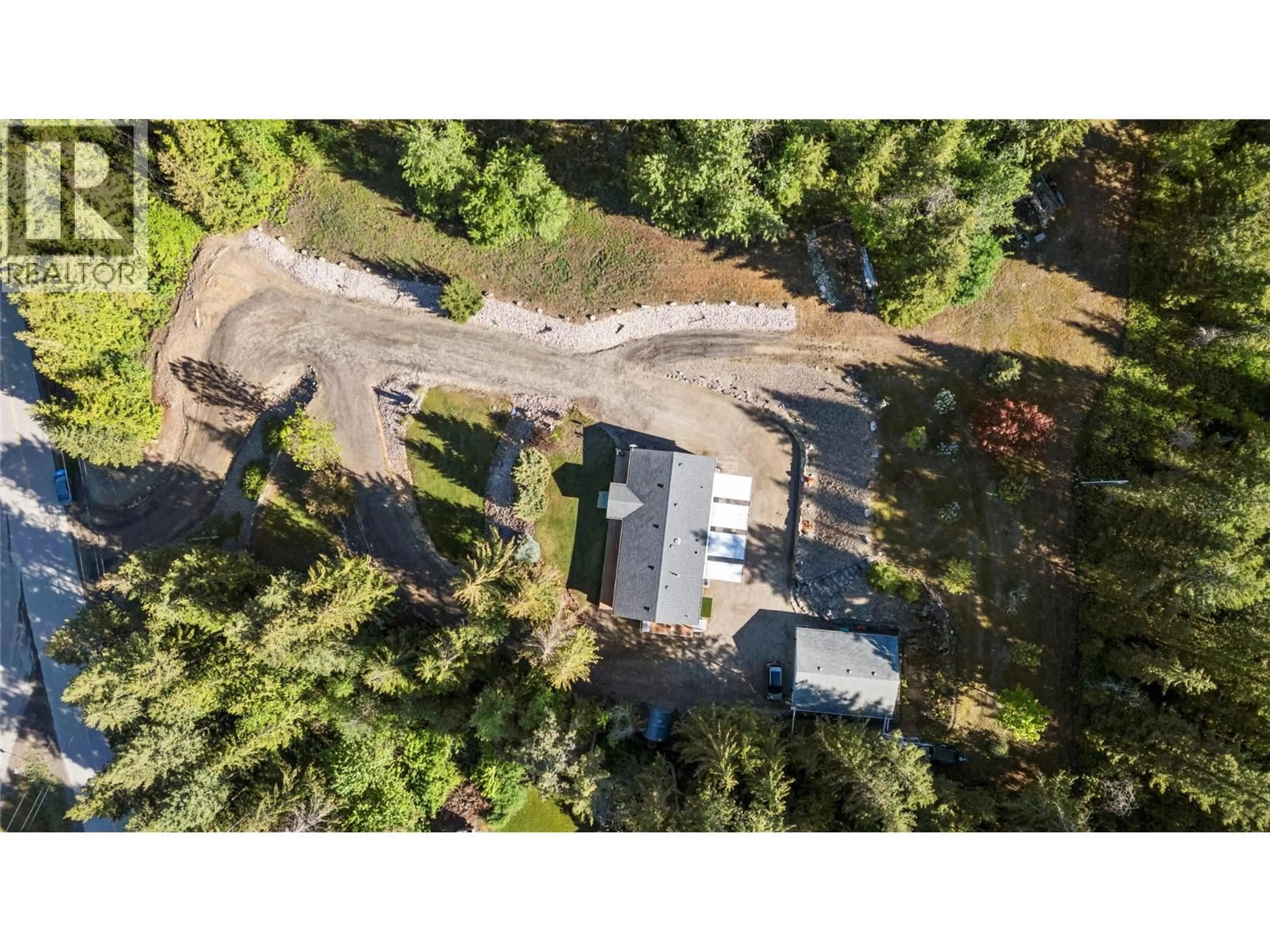 A pic from outside/outdoor area/front of a property/back of a property/a pic from drone, street for 1034 GRANDVIEW BENCH ROAD, Salmon Arm British Columbia V1E2X7