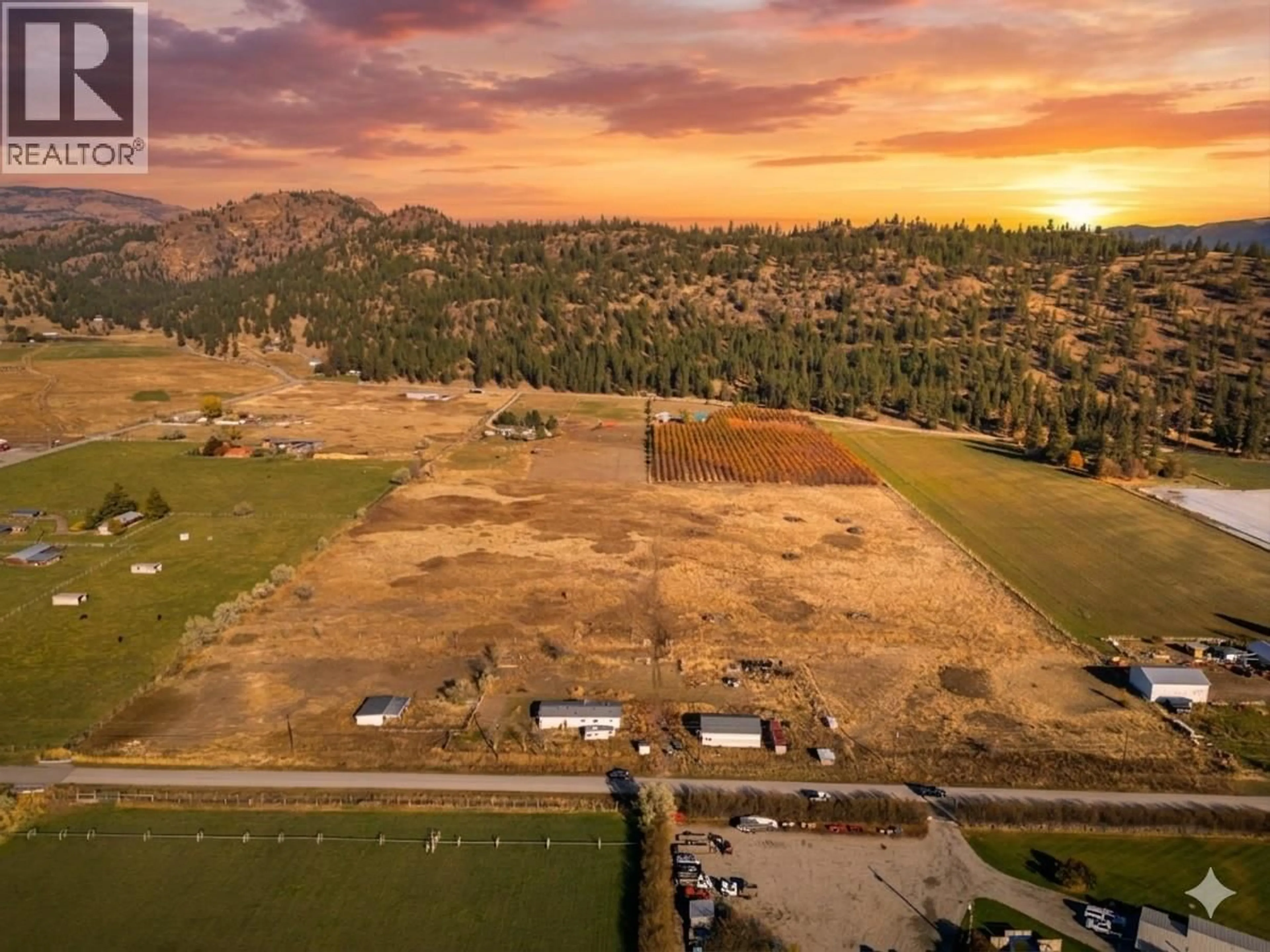 A pic from outside/outdoor area/front of a property/back of a property/a pic from drone, mountain view for 261 + 297 JONES WAY ROAD, Oliver British Columbia V0H1T5