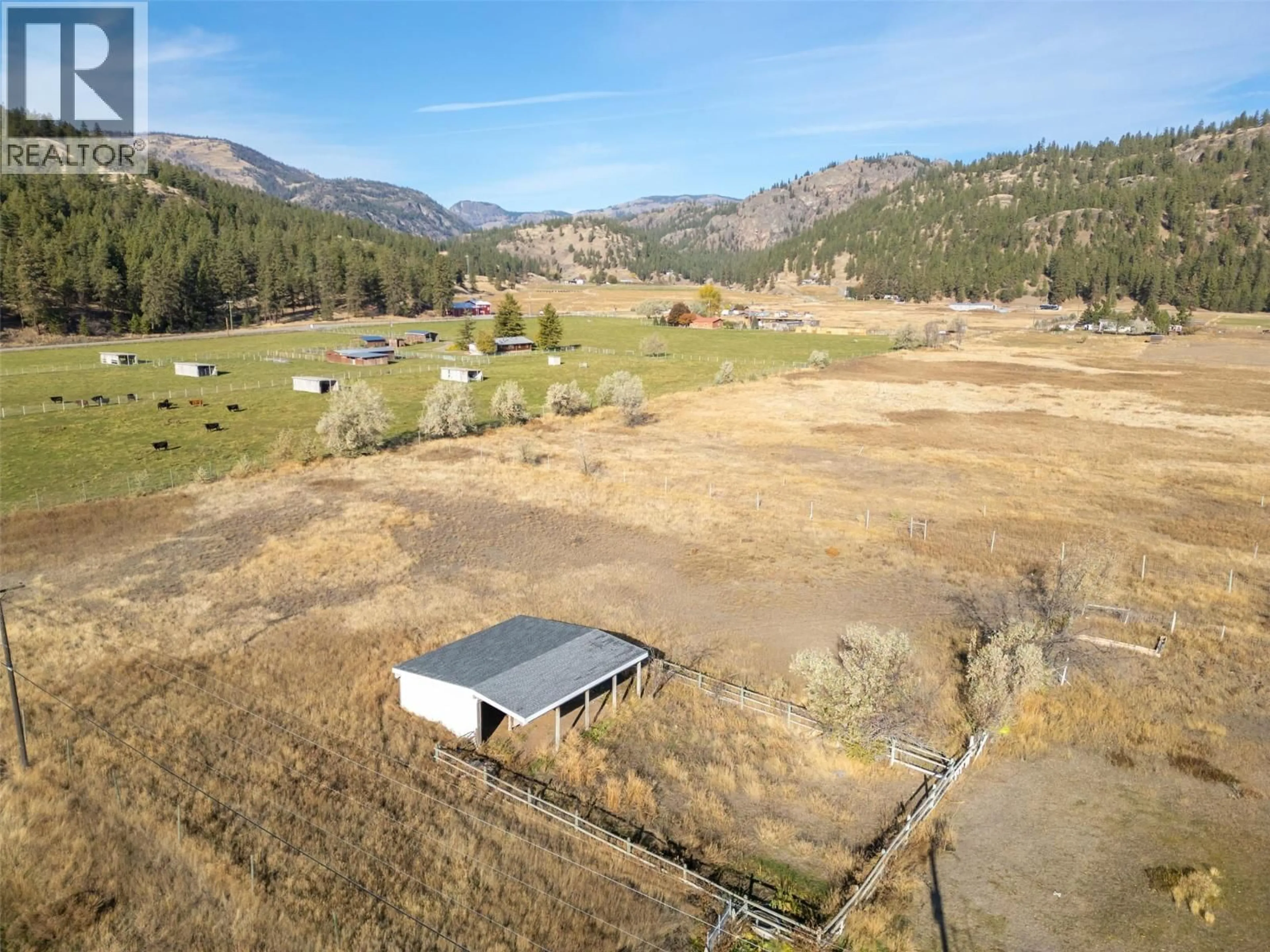 A pic from outside/outdoor area/front of a property/back of a property/a pic from drone, mountain view for 261 + 297 JONES WAY ROAD, Oliver British Columbia V0H1T5