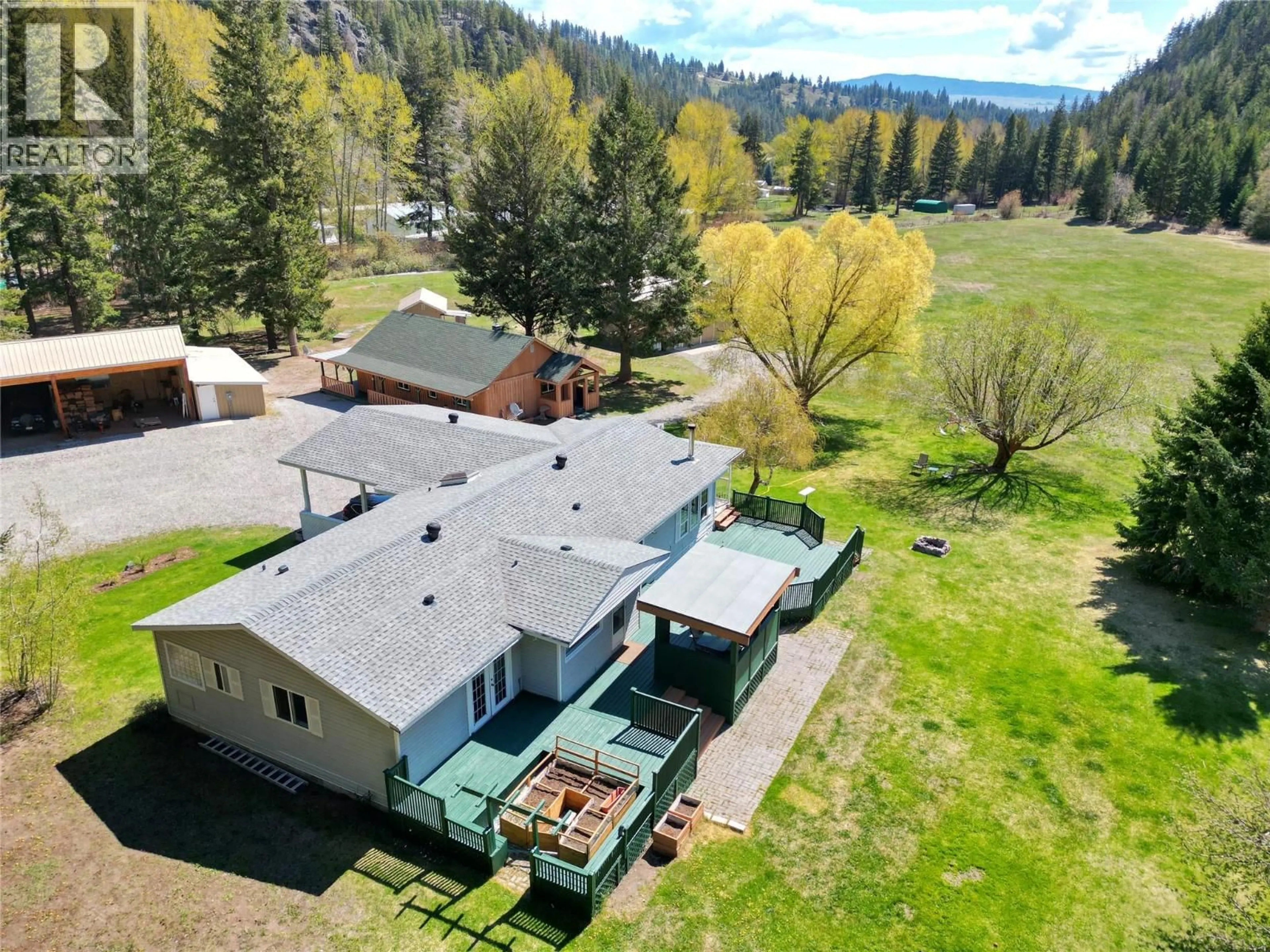 A pic from outside/outdoor area/front of a property/back of a property/a pic from drone, mountain view for 1094 HIGHWAY 5A OTHER, Princeton British Columbia V0X1W0