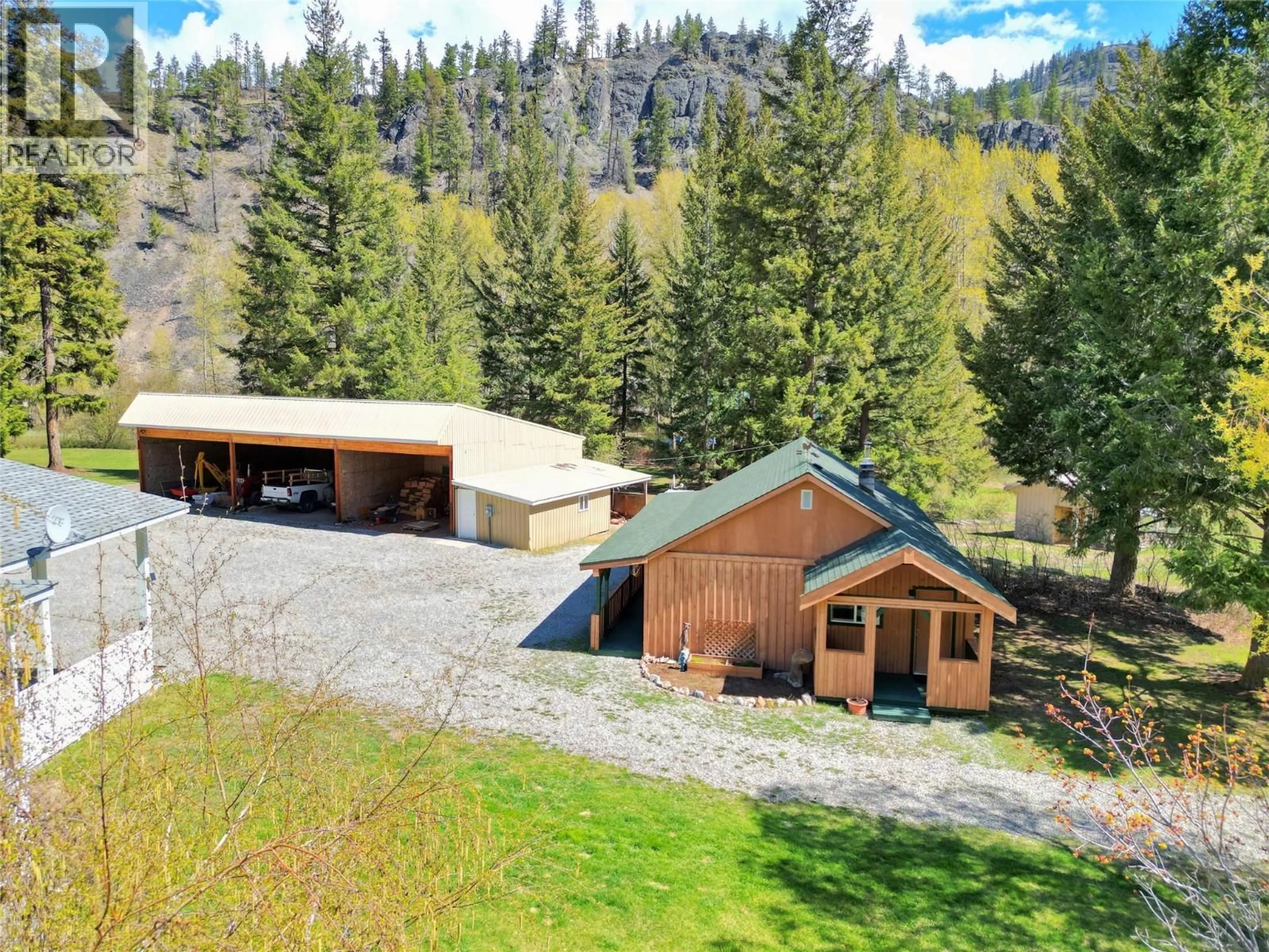 A pic from outside/outdoor area/front of a property/back of a property/a pic from drone, mountain view for 1094 HIGHWAY 5A OTHER, Princeton British Columbia V0X1W0
