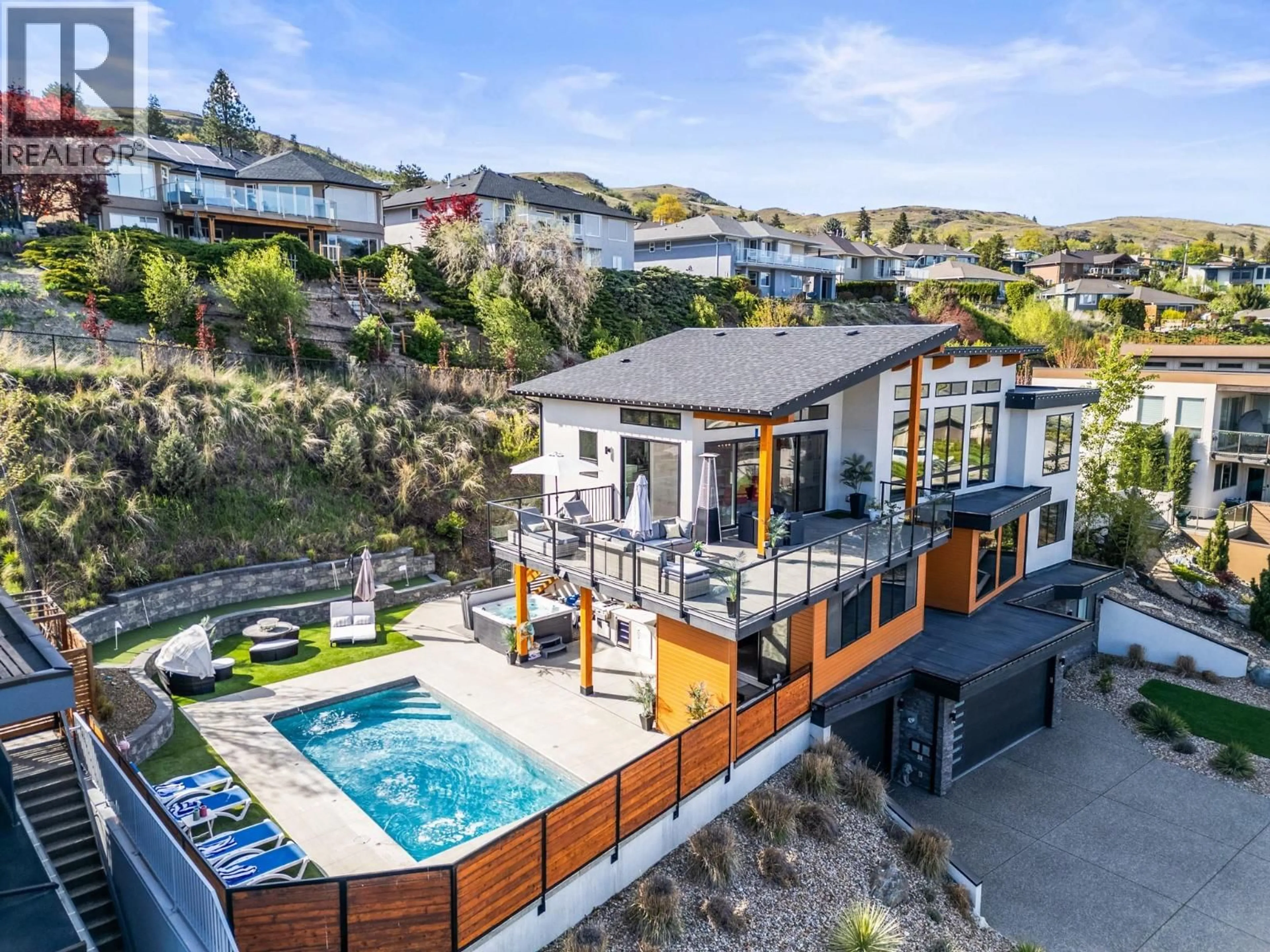 A pic from outside/outdoor area/front of a property/back of a property/a pic from drone, mountain view for 7938 GRAYSTONE DRIVE, Coldstream British Columbia V1B4A9