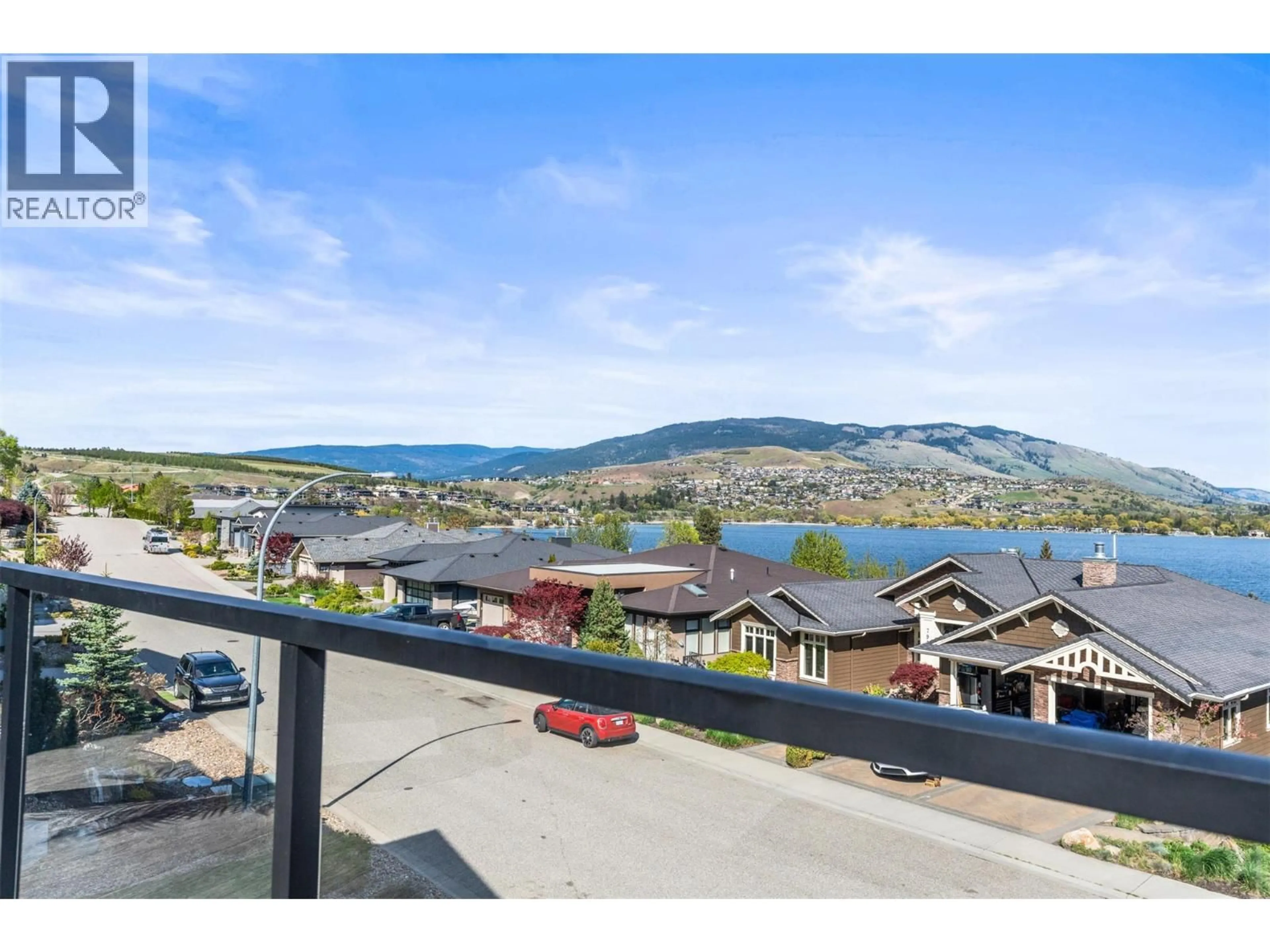 A pic from outside/outdoor area/front of a property/back of a property/a pic from drone, mountain view for 7938 GRAYSTONE DRIVE, Coldstream British Columbia V1B4A9