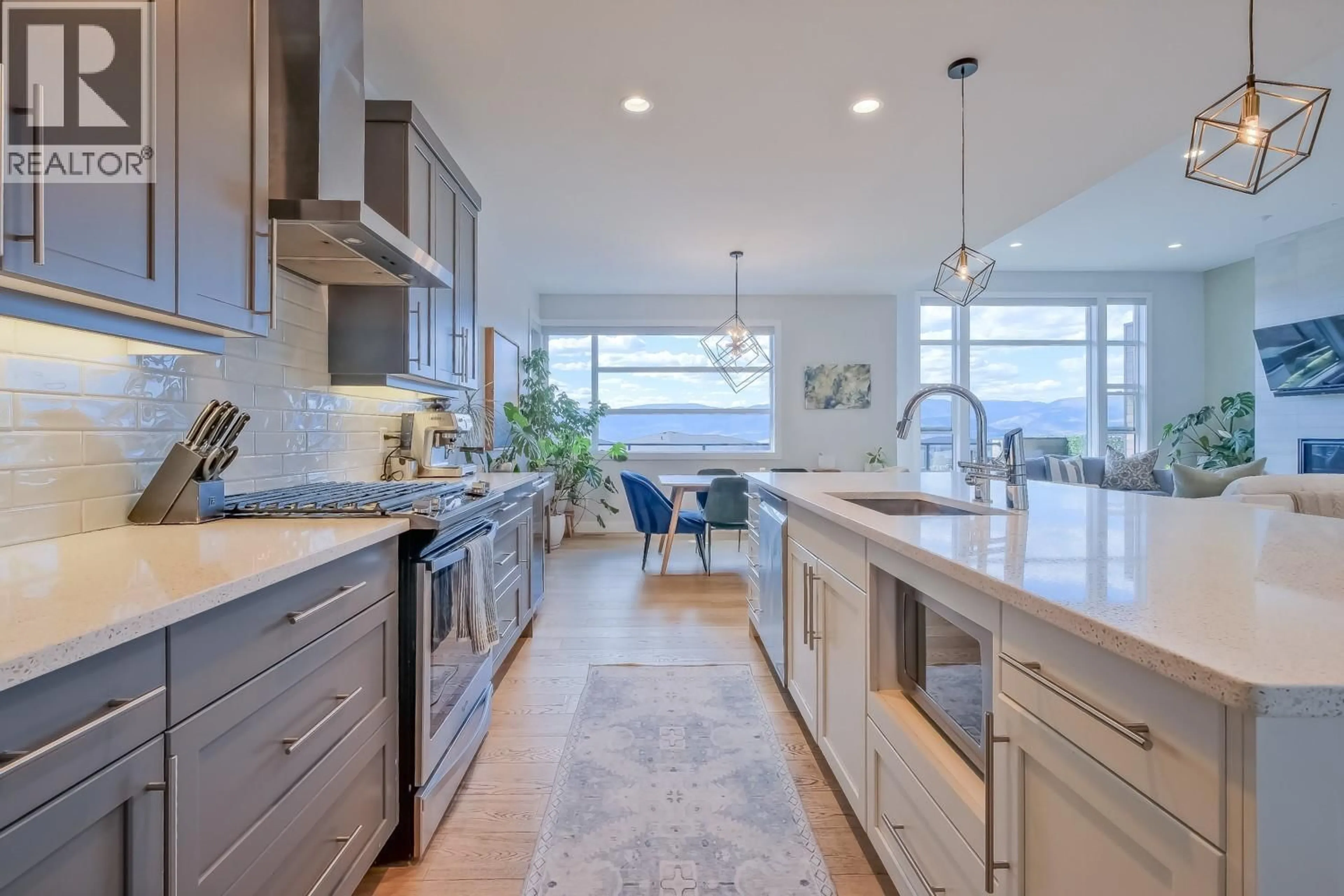 Open concept kitchen, ceramic/tile floor for 5643 JASPER WAY, Kelowna British Columbia V1W5L7