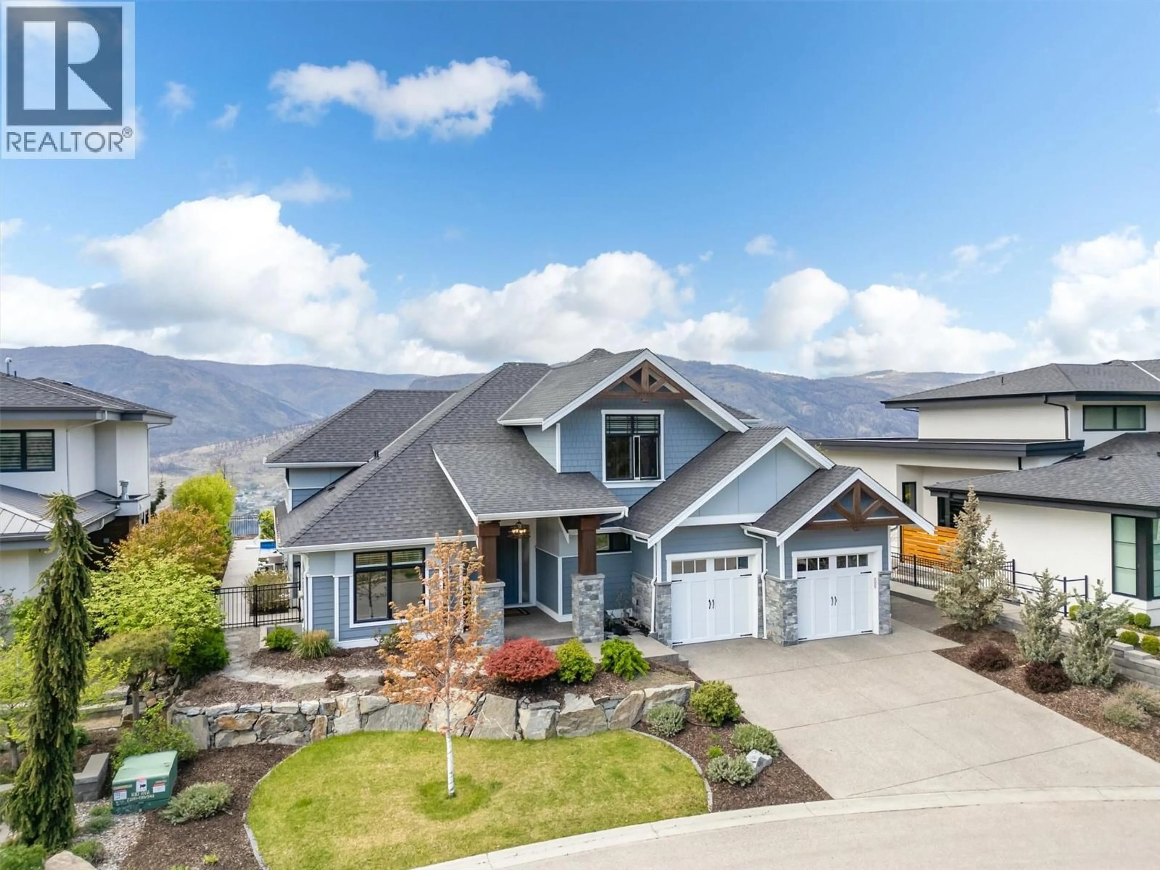 Home with vinyl exterior material, mountain view for 98 RED SKY COURT, Kelowna British Columbia V1V3G4