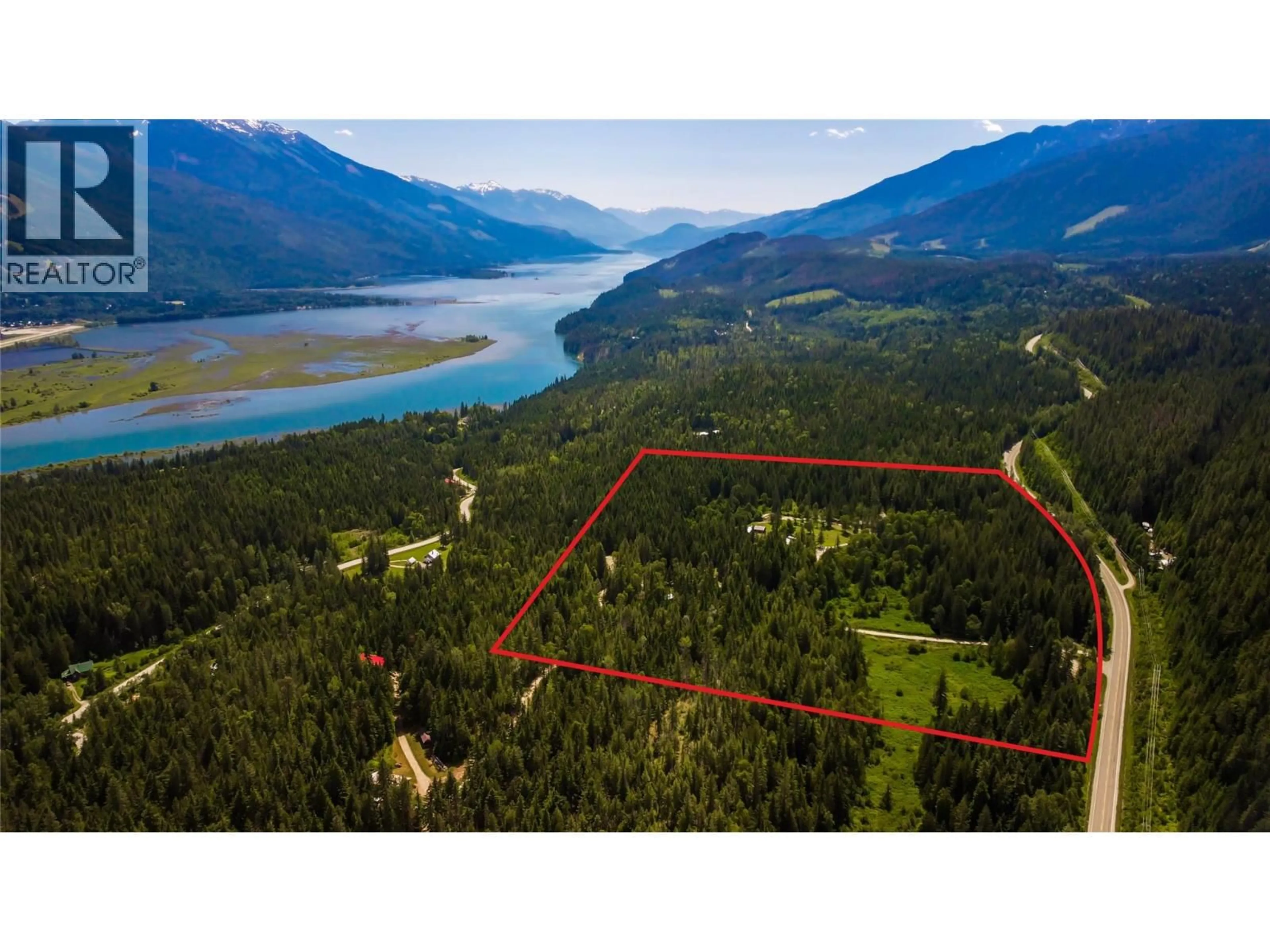 A pic from outside/outdoor area/front of a property/back of a property/a pic from drone, water/lake/river/ocean view for 1750 HIGHWAY 23 SOUTH HIGHWAY SOUTH, Revelstoke British Columbia V0E2S0
