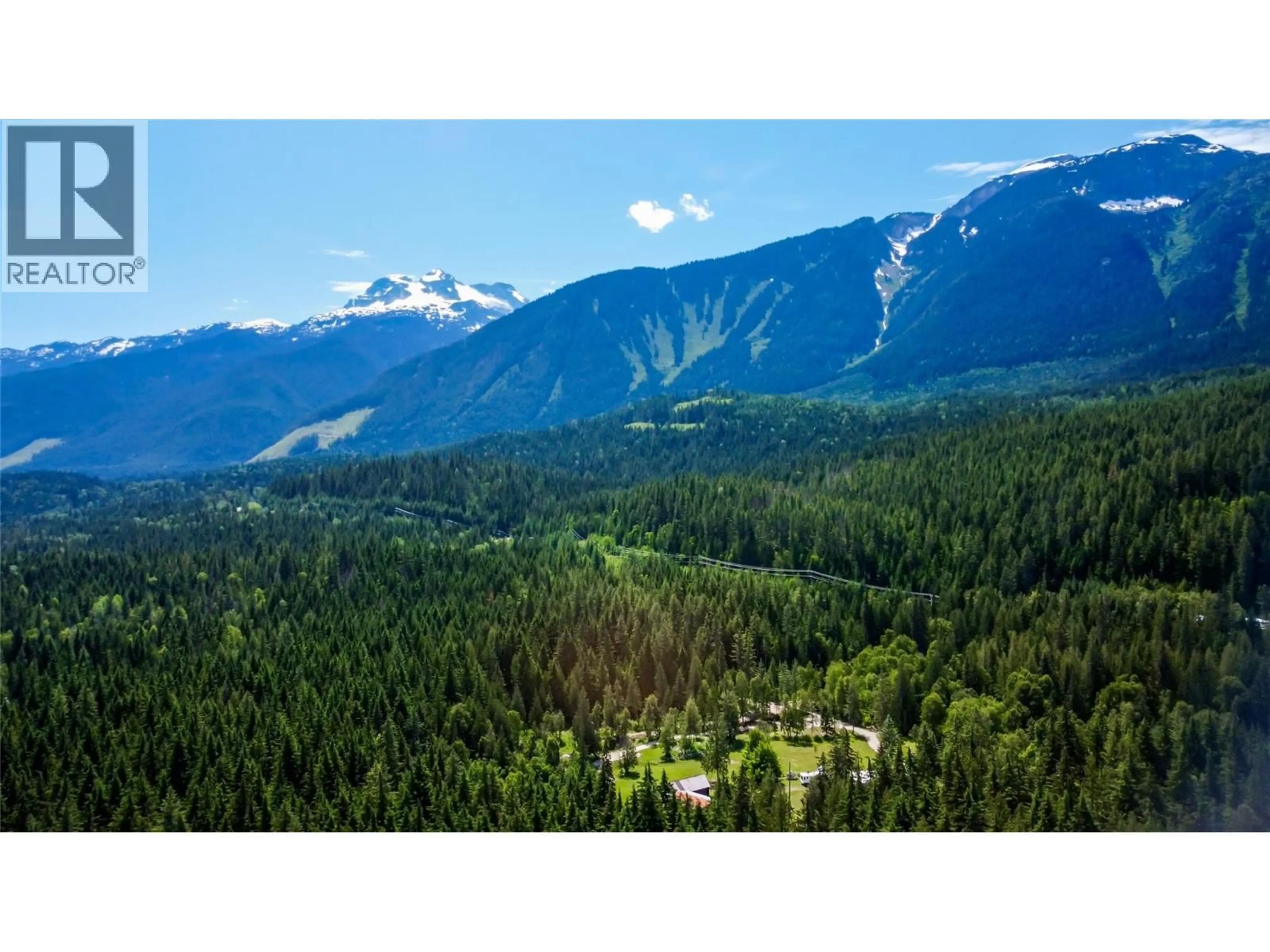 A pic from outside/outdoor area/front of a property/back of a property/a pic from drone, mountain view for 1750 HIGHWAY 23 SOUTH HIGHWAY SOUTH, Revelstoke British Columbia V0E2S0