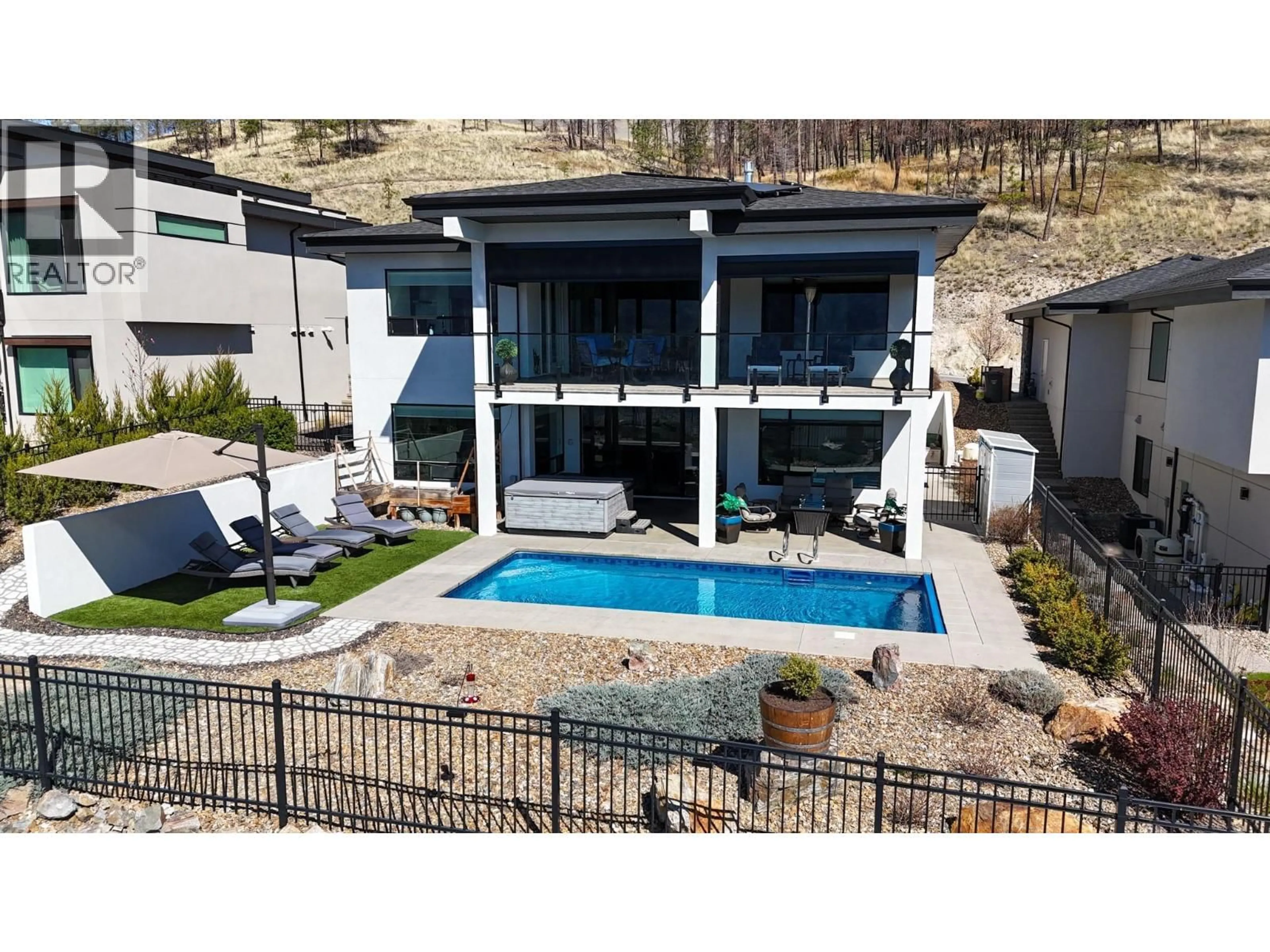 A pic from outside/outdoor area/front of a property/back of a property/a pic from drone, mountain view for 9882 BEACON HILL DRIVE, Lake Country British Columbia V4V0A9