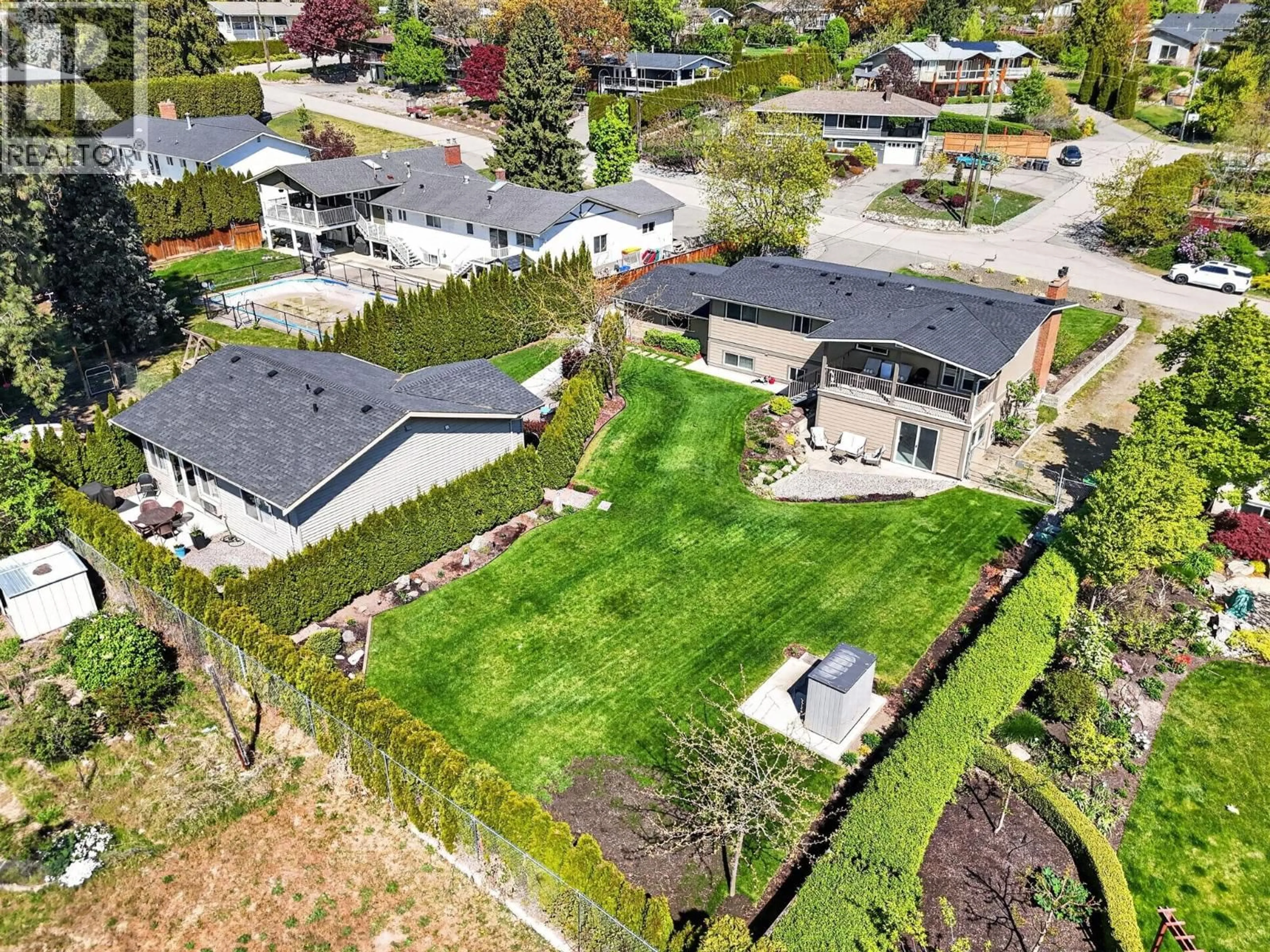 A pic from outside/outdoor area/front of a property/back of a property/a pic from drone, street for 905 RUMNEY ROAD, West Kelowna British Columbia V1Z1H8