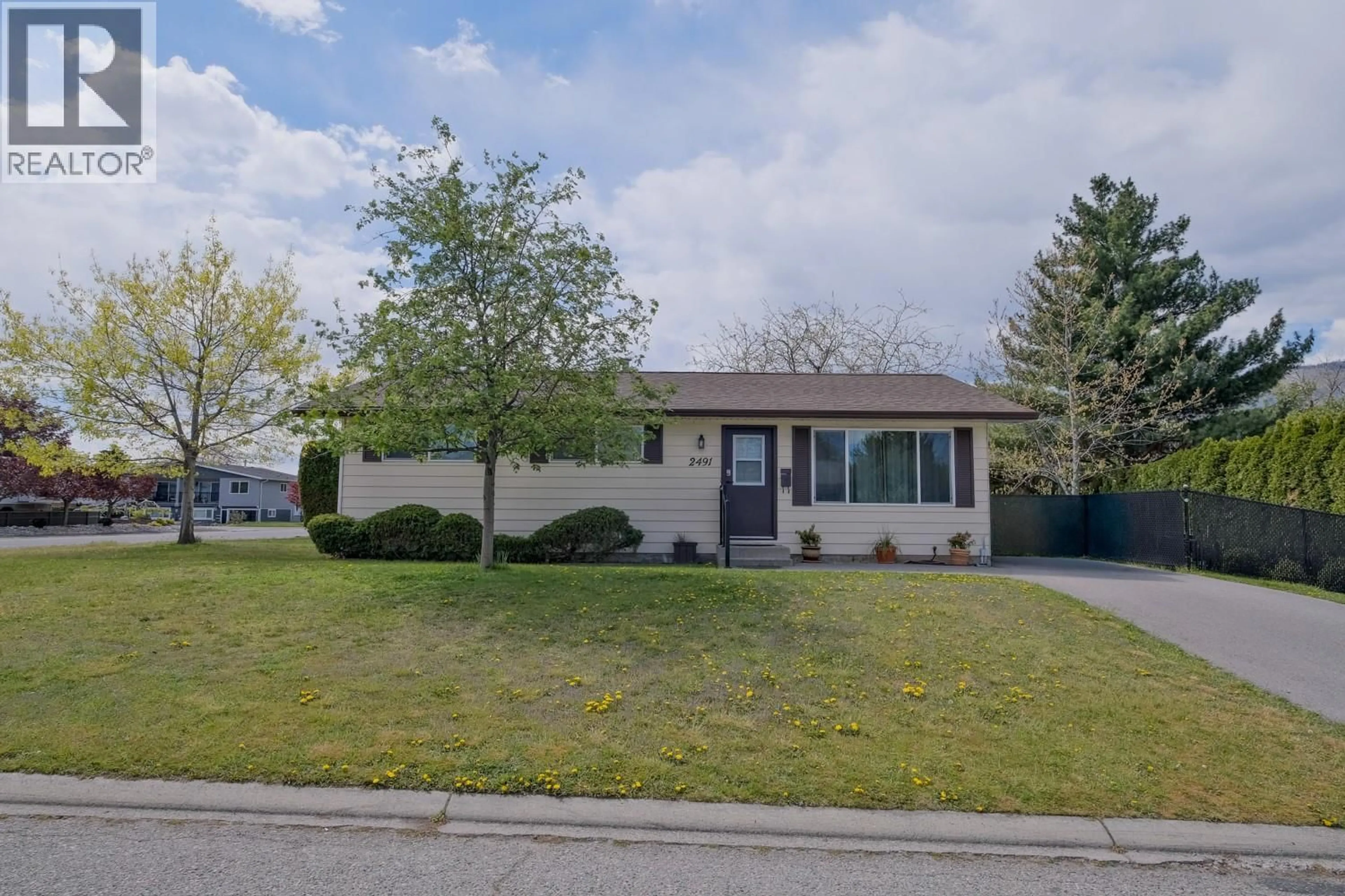 Home with vinyl exterior material, street for 2491 BASKIN STREET, Penticton British Columbia V2A6R1