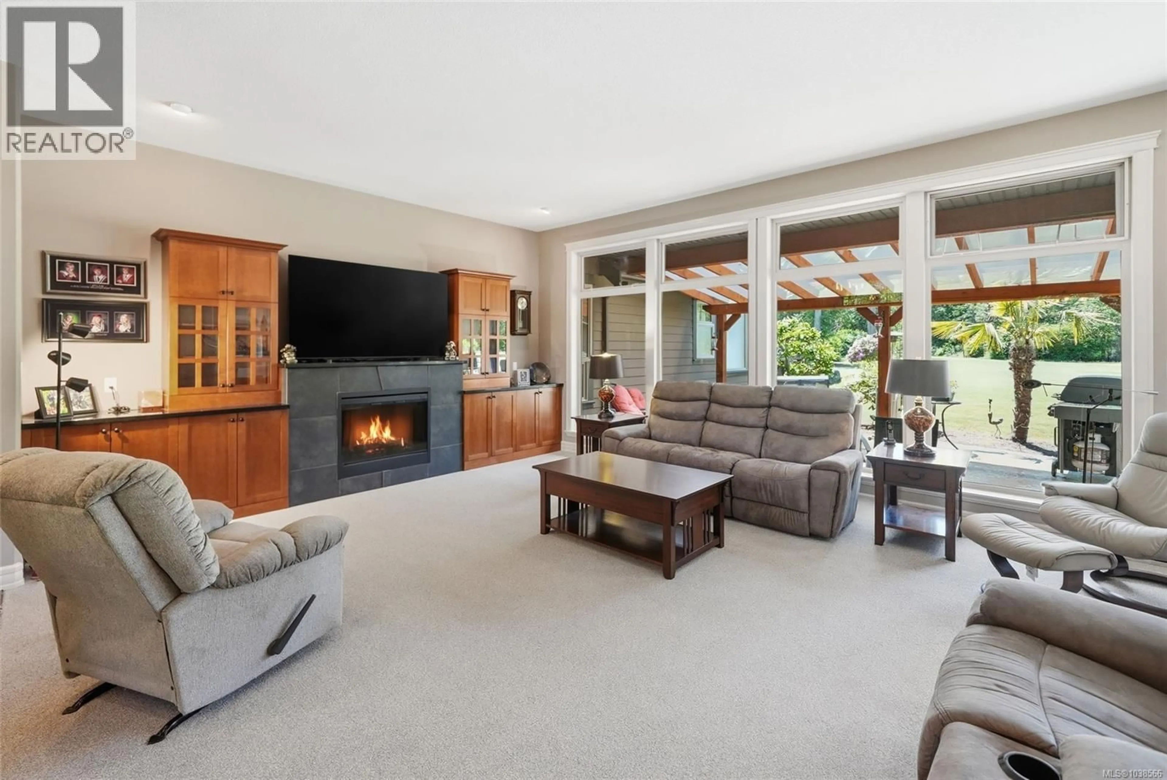 Living room with furniture, unknown for 990 VIEW ROAD, Qualicum Beach British Columbia V9K1N3