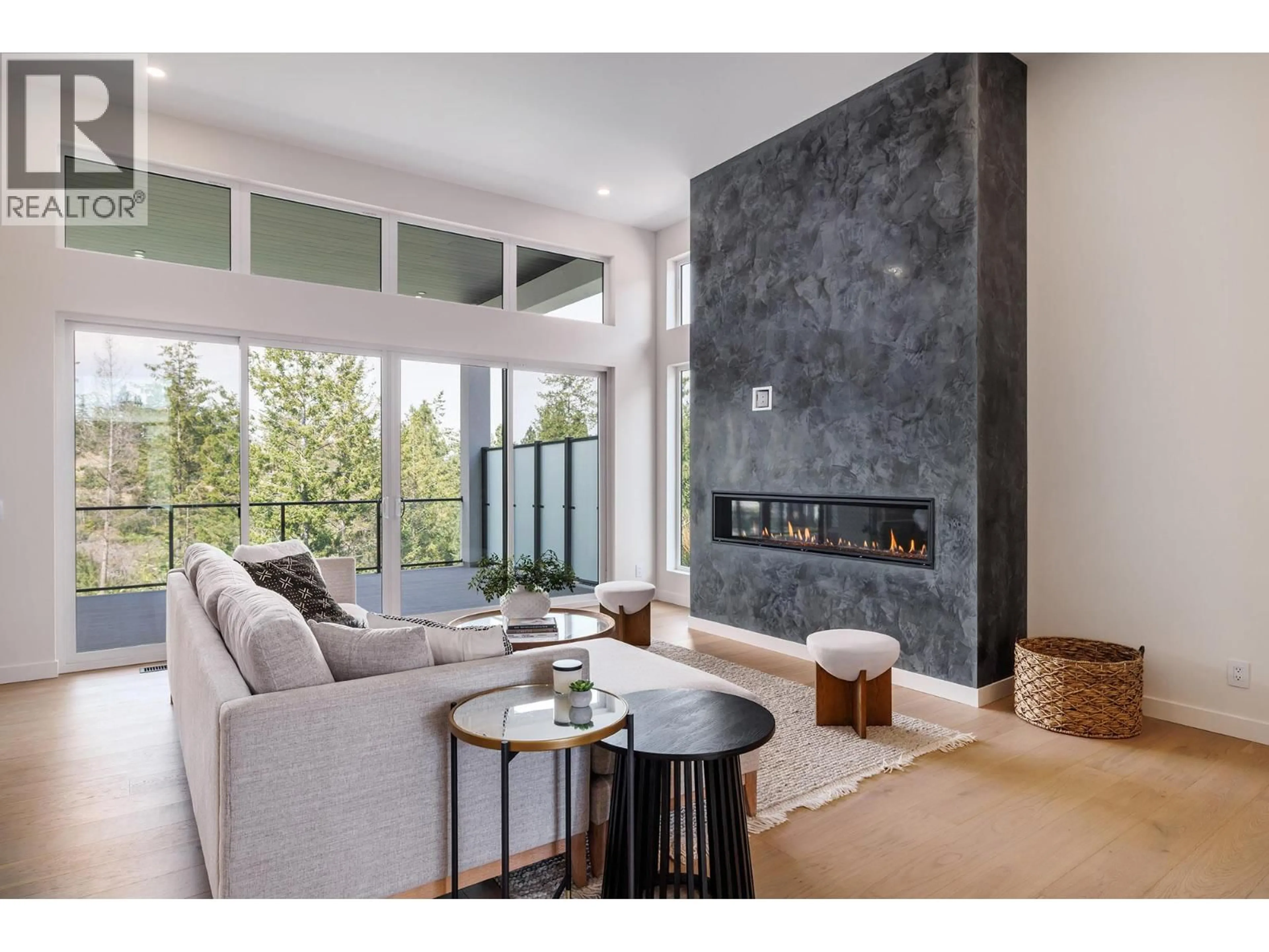 Living room with furniture, ceramic/tile floor for 10274 BEACON HILL DRIVE, Lake Country British Columbia V4V0A9