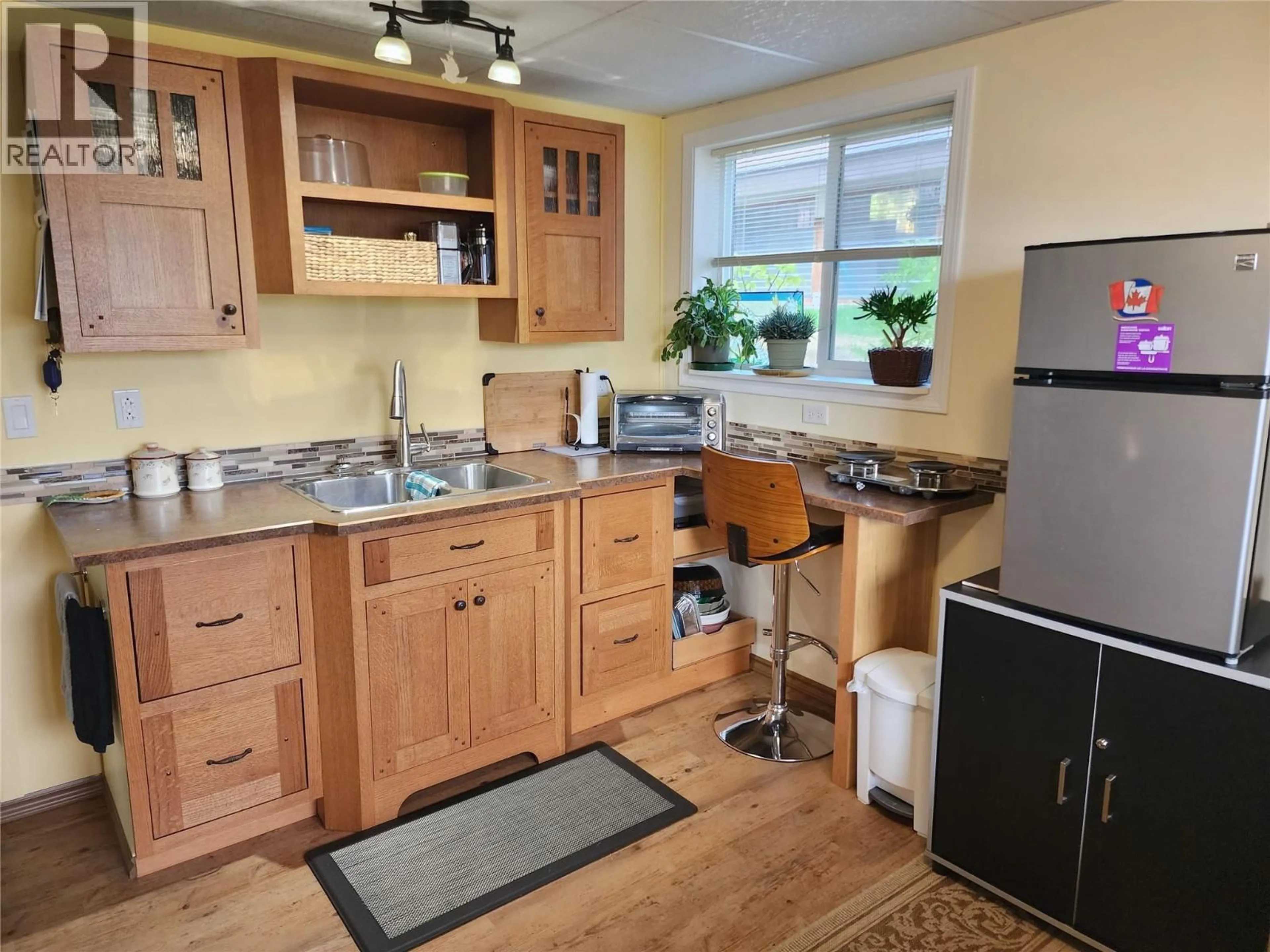 Standard kitchen, wood/laminate floor for 8350 BUSK ROAD, Balfour British Columbia V0G1C0