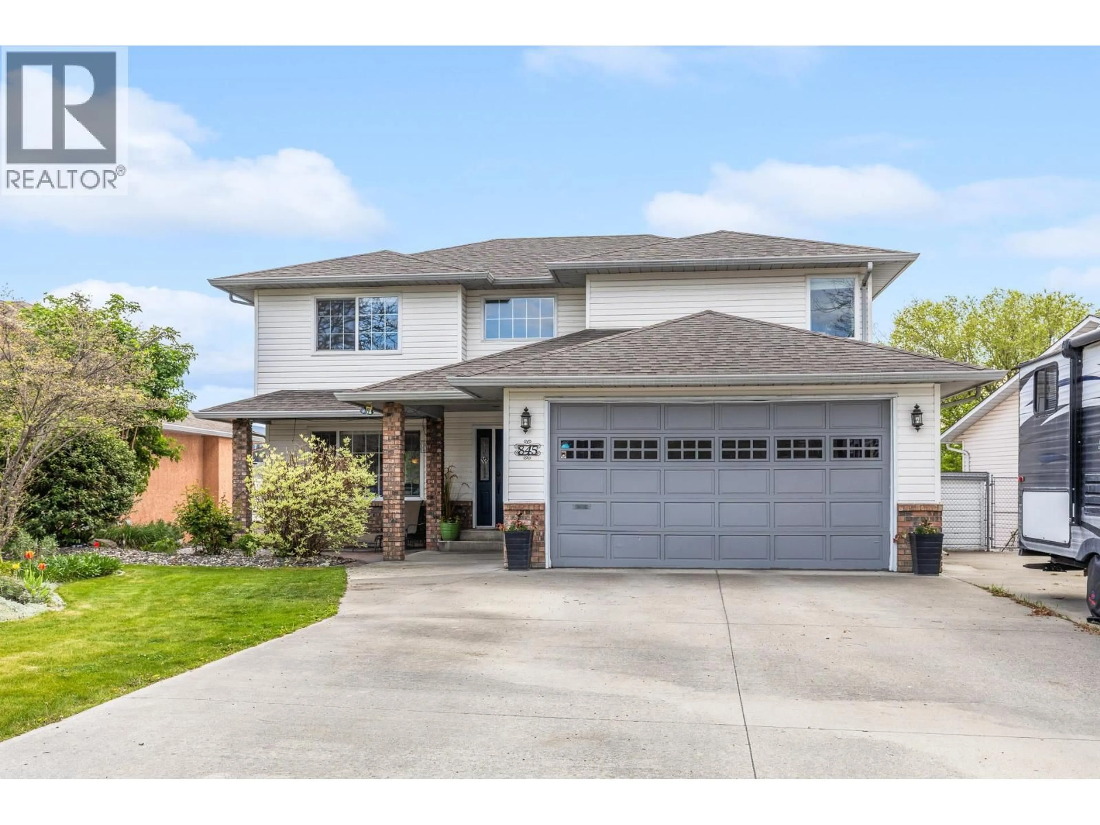 Home with brick exterior material, street for 845 HOLLYDELL ROAD, Kelowna British Columbia V1X1L6