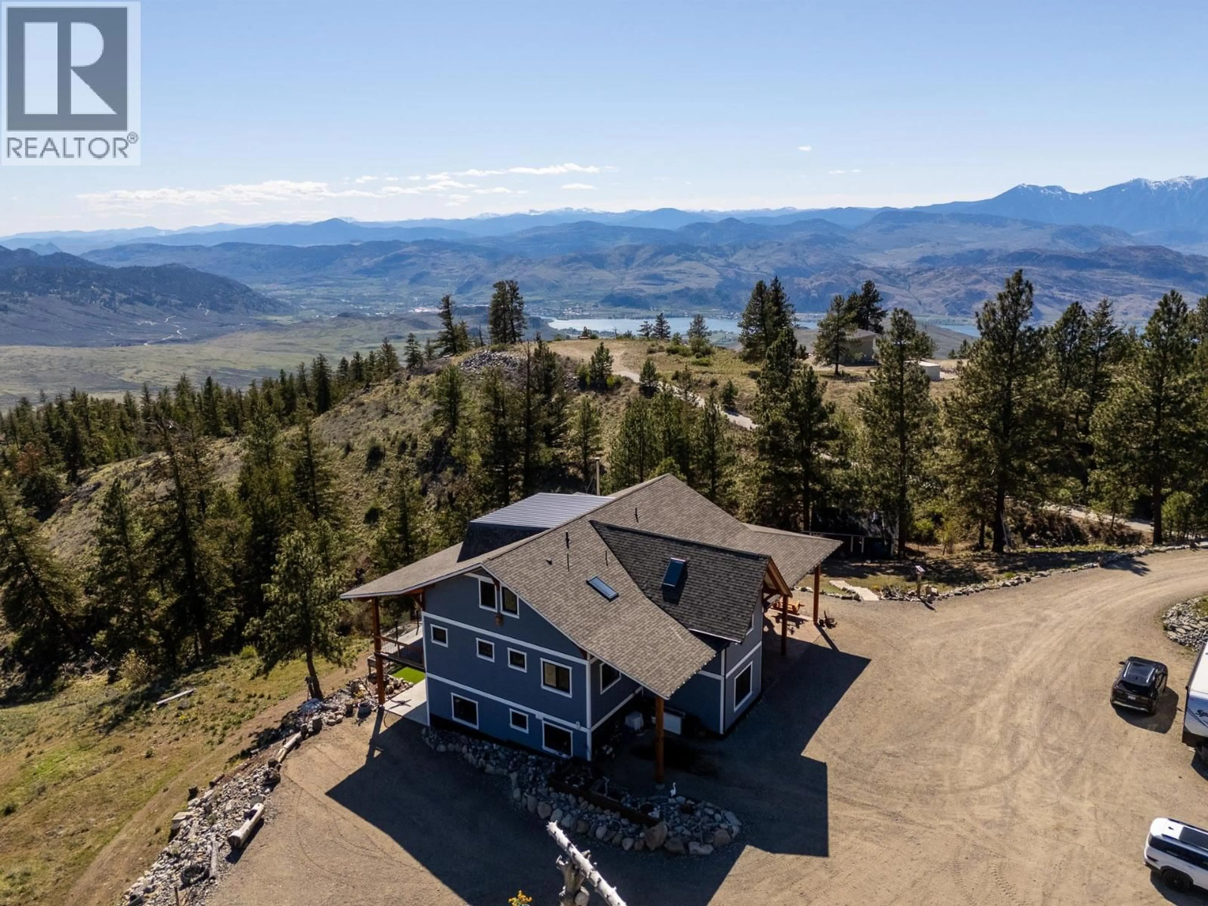 A pic from outside/outdoor area/front of a property/back of a property/a pic from drone, mountain view for 137 EAGLE POINT, Osoyoos British Columbia V0H1V6