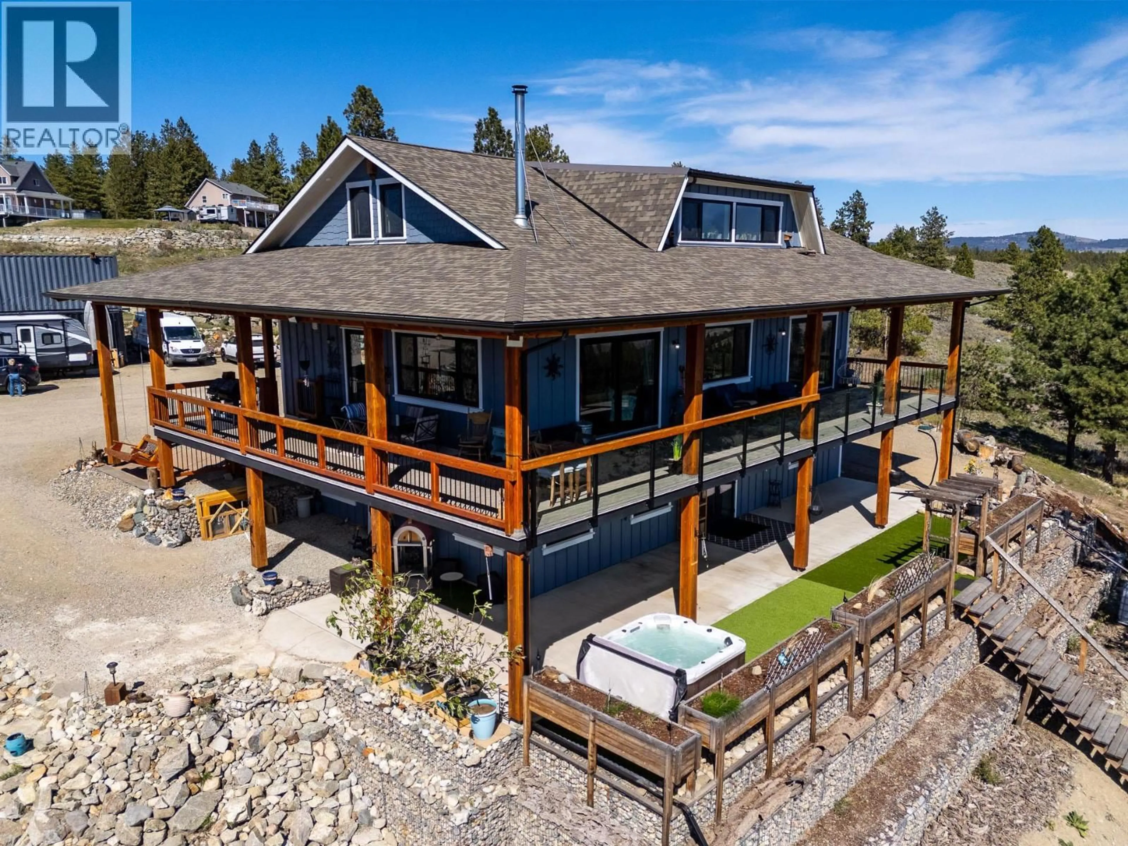A pic from outside/outdoor area/front of a property/back of a property/a pic from drone, water/lake/river/ocean view for 137 EAGLE POINT, Osoyoos British Columbia V0H1V6