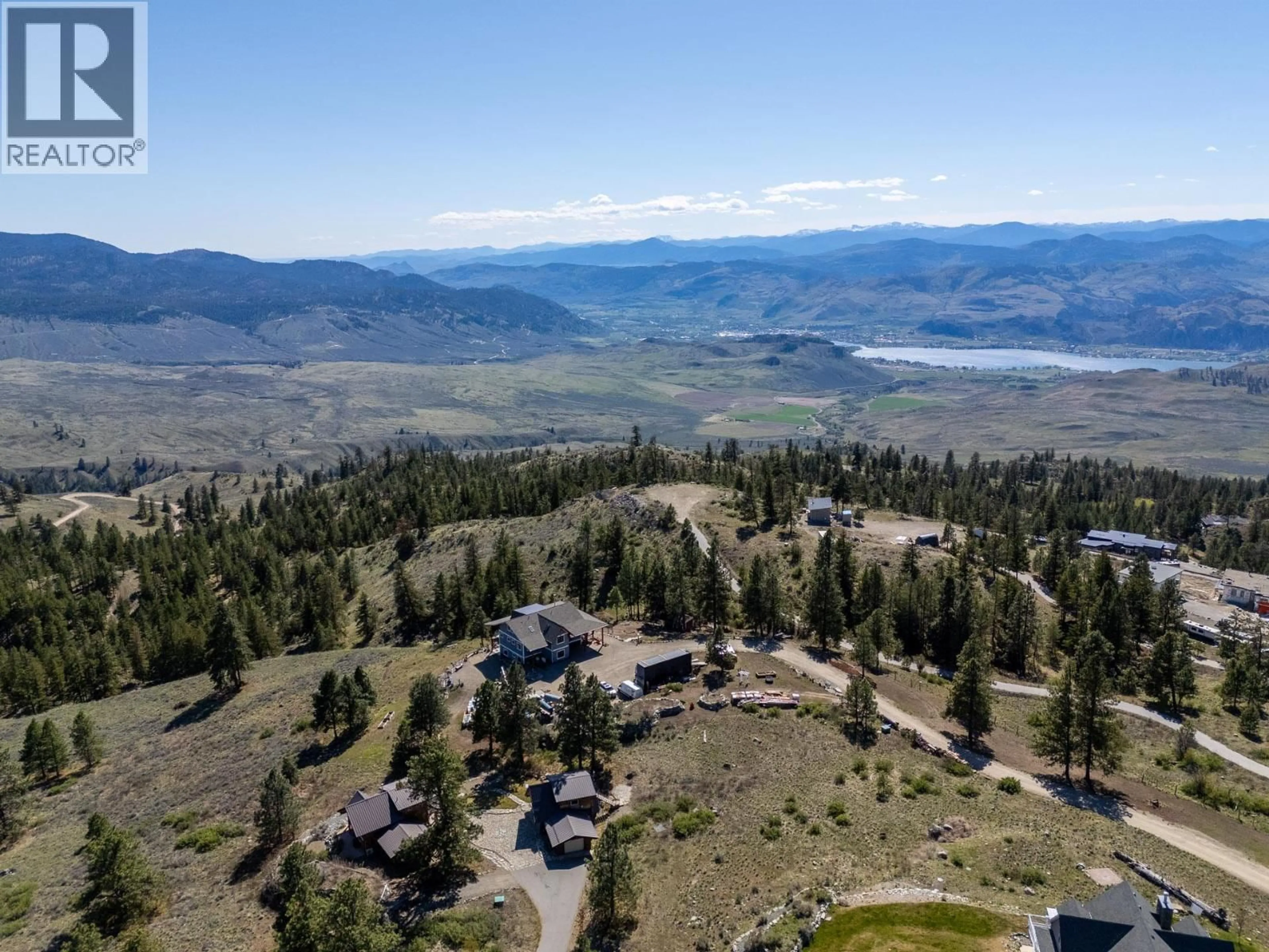 A pic from outside/outdoor area/front of a property/back of a property/a pic from drone, mountain view for 137 EAGLE POINT, Osoyoos British Columbia V0H1V6
