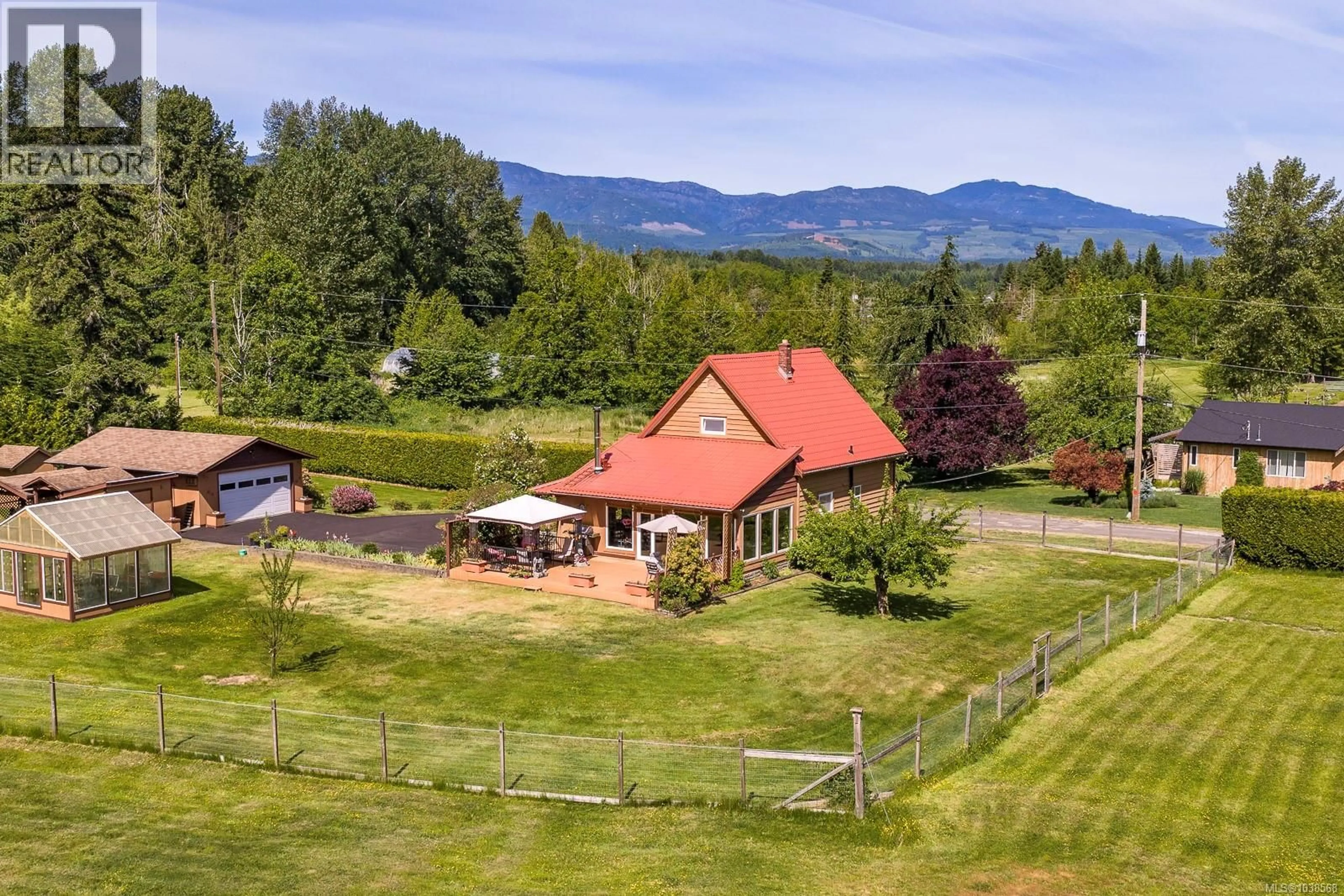 A pic from outside/outdoor area/front of a property/back of a property/a pic from drone, mountain view for 2924 BAIRD ROAD, Courtenay British Columbia V9N9N6