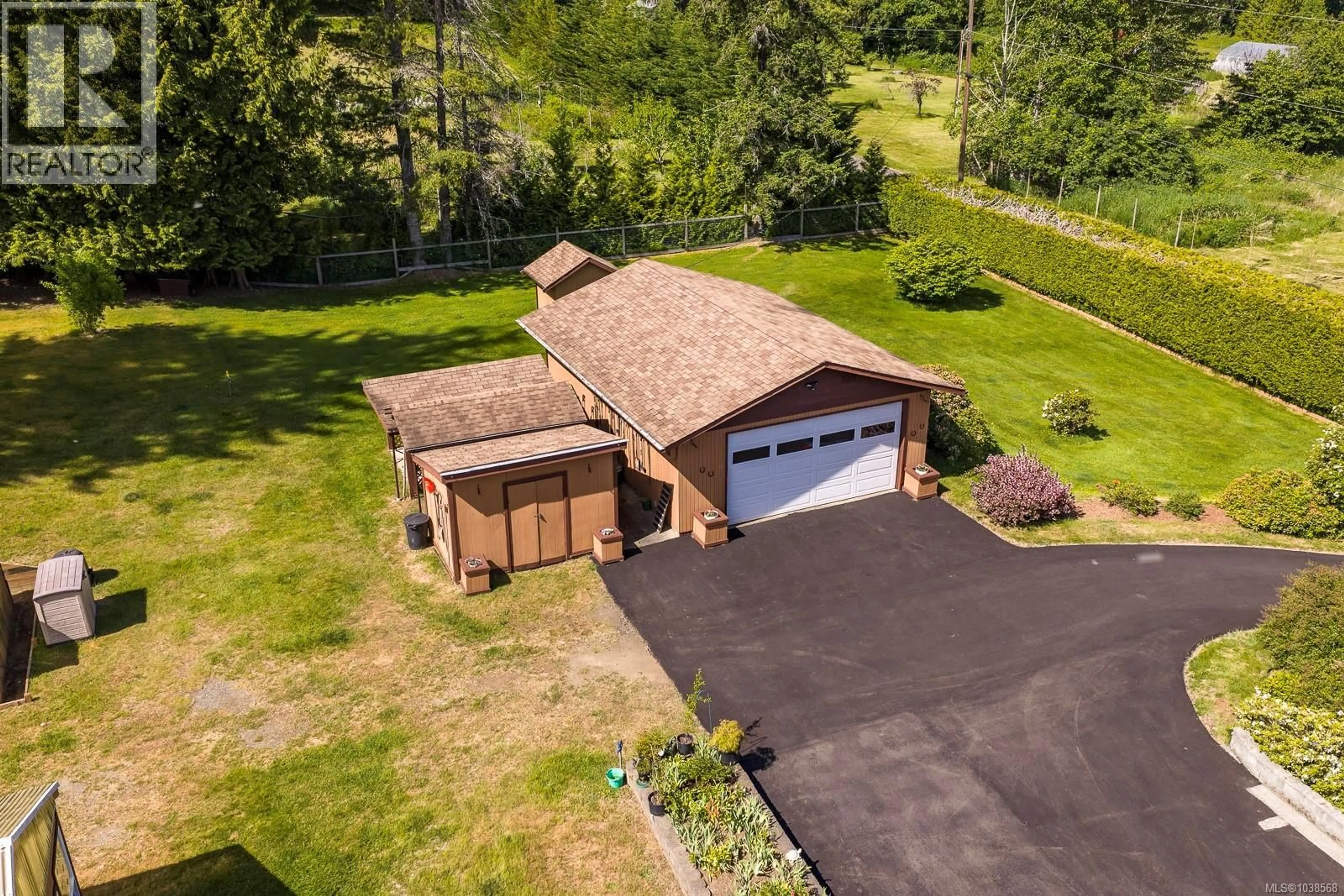 A pic from outside/outdoor area/front of a property/back of a property/a pic from drone, unknown for 2924 BAIRD ROAD, Courtenay British Columbia V9N9N6
