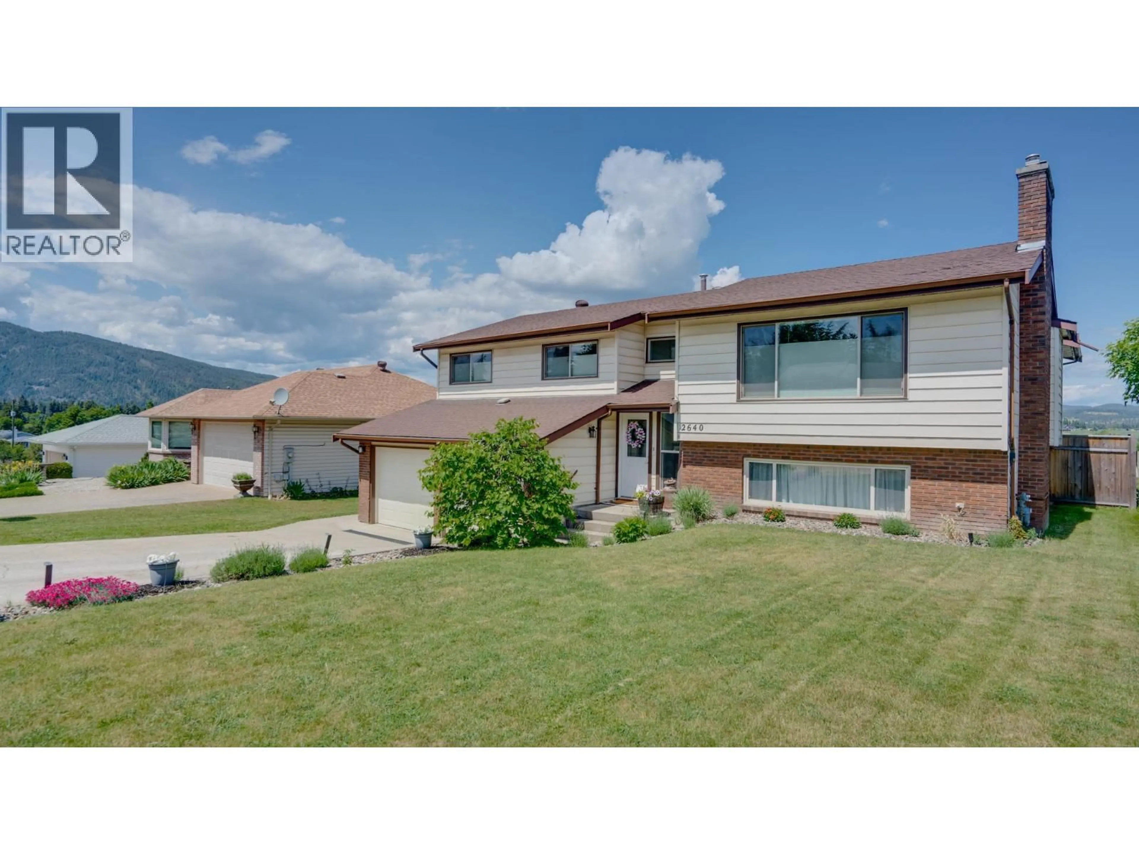 Home with vinyl exterior material, mountain view for 2640 CATHERINE CRESCENT, Armstrong British Columbia V4Y0B3